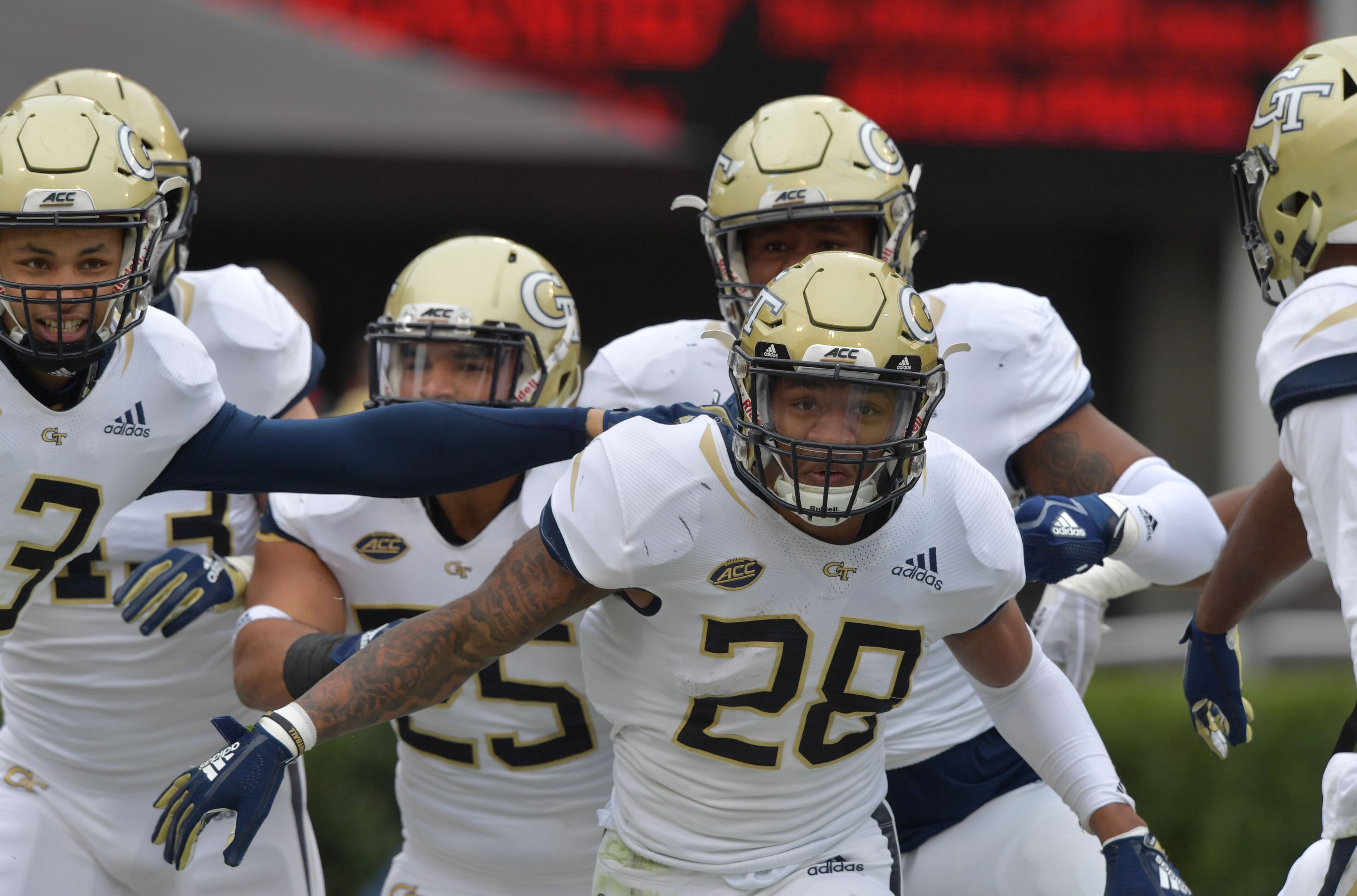 November 24, 2018 Athens - Georgia Tech defensive back Juanyeh Thomas (28) celebrates after he scored a touchdown during the second half in a NCAA college football game at Sanford Stadium on Saturday, November 24, 2018. Georgia won 45 - 21 over the Georgia Tech. HYOSUB SHIN / HSHIN@AJC.COM