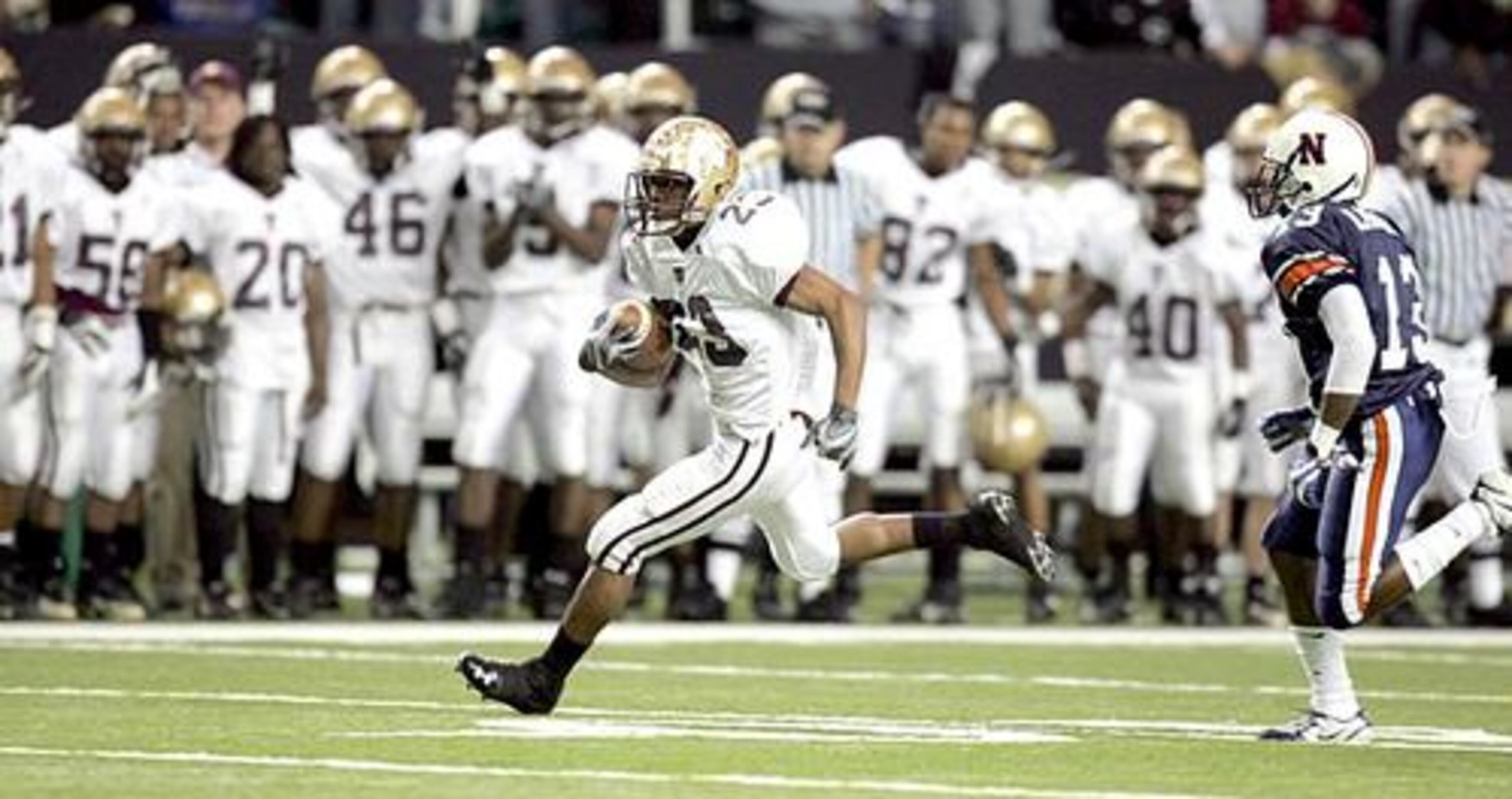 Northside-Warner Robins defender Darius McGee can't catch Tucker RB Drayton Calhoun. Calhoun had 140 rushing on 11 carries in the first half.