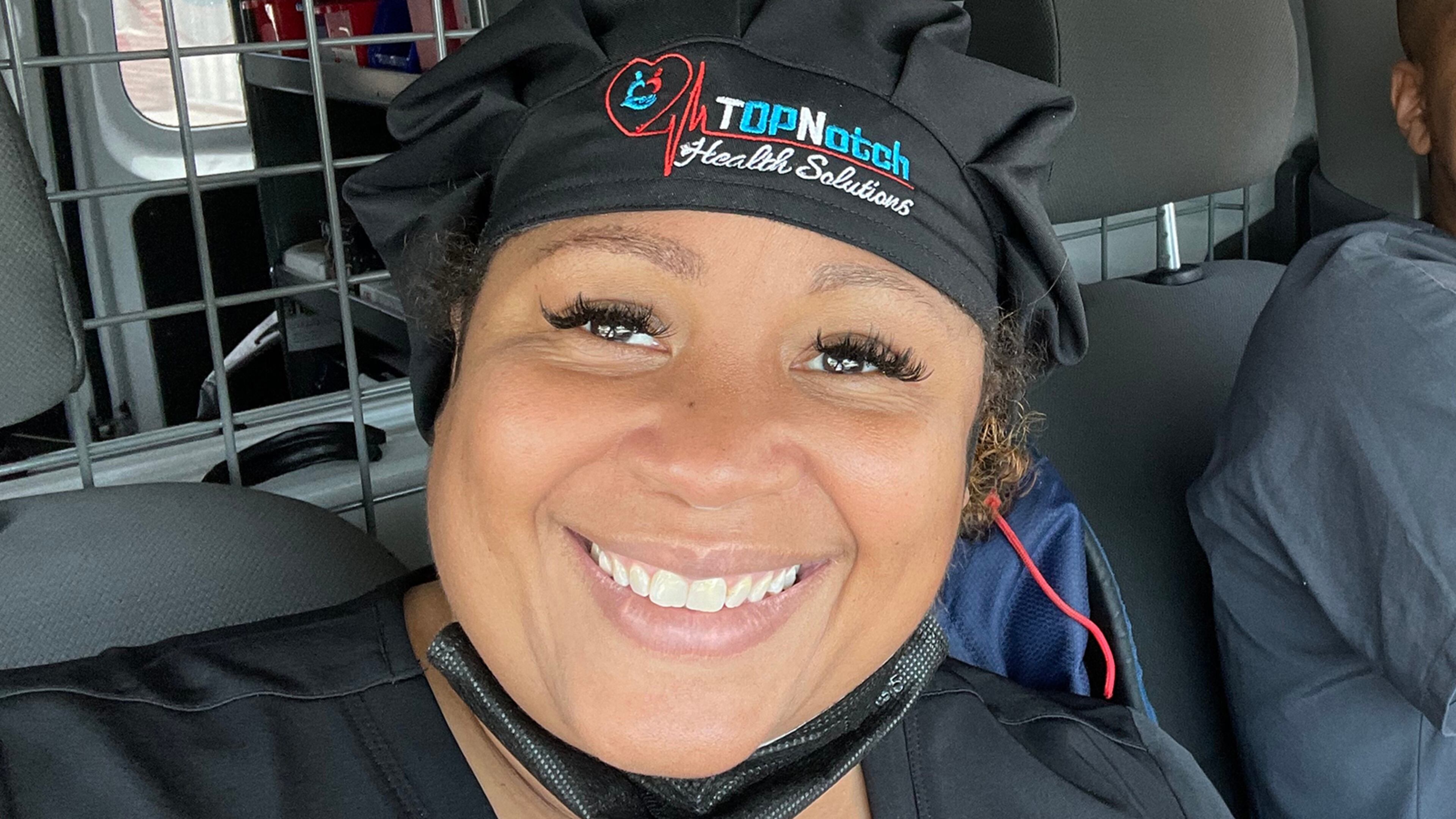 Top Notch Health Solutions’ Paula Richardson pictured in her mobile testing van with a fellow staffer, Quanteria Morton Jr. (Courtesy of Paula Richardson)