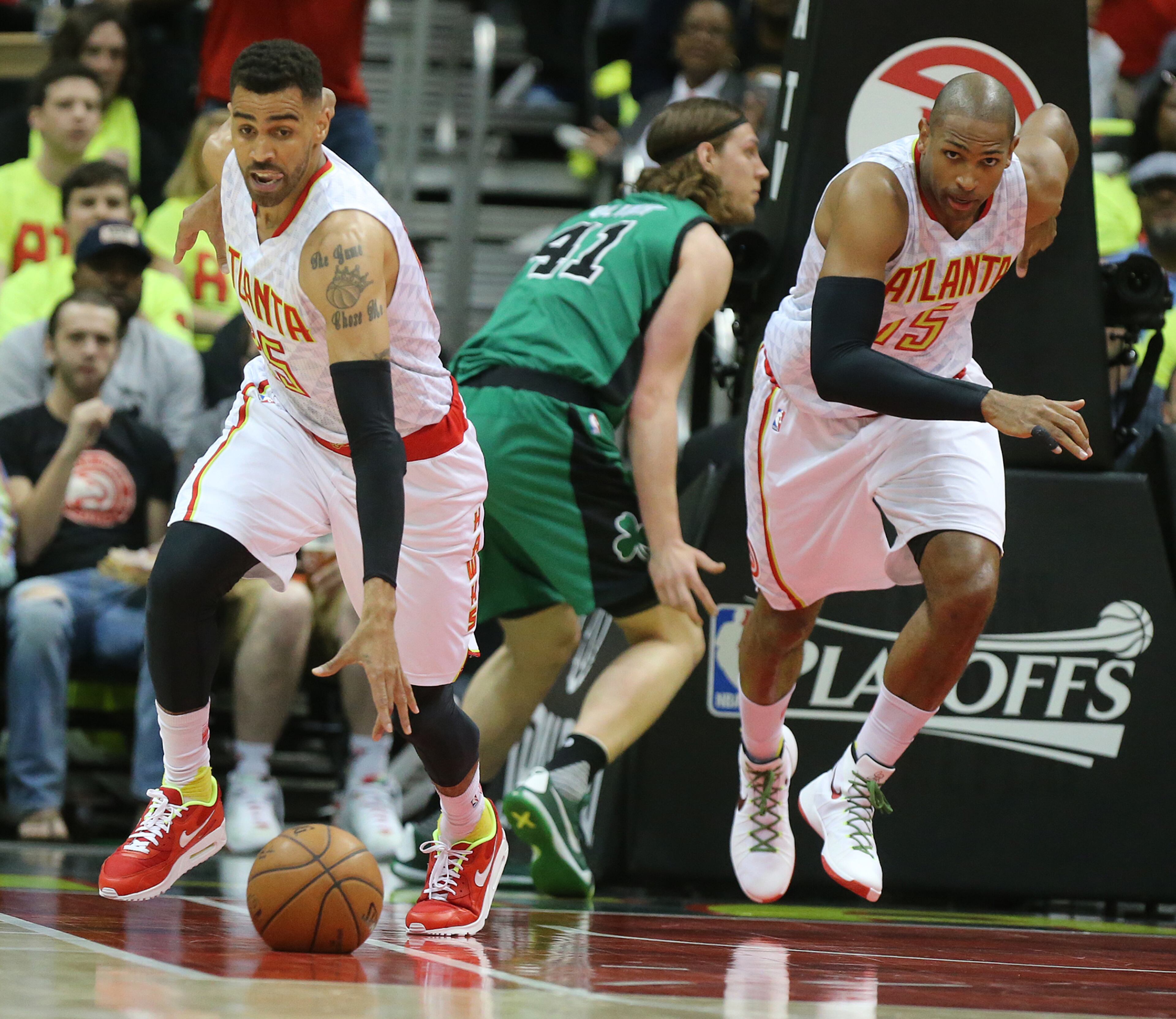 041616 ATLANTA: Hawks Thabo Sefolosha (from left) steals from Celtics Kelly Olynyk while Al Horford follows on the fast break in their NBA Eastern Conference first round playoff game at Philips Arena on Saturday, April 16, 2016. Curtis Compton / ccompton@ajc.com