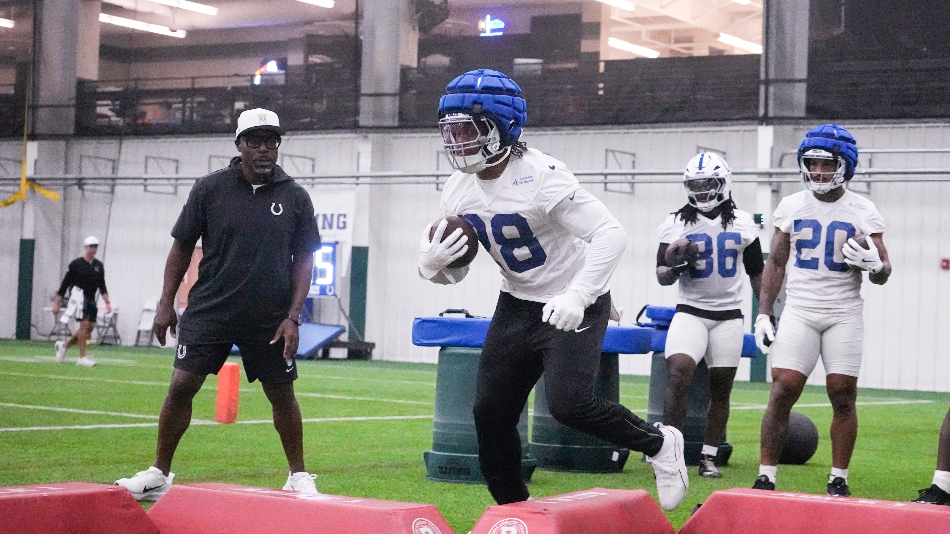 Indianapolis Colts running back Jonathan Taylor (28) runs a drill during practice at the NFL football team's training camp in Westfield, Ind., Saturday, Aug. 1, 2026. (AP Photo/Michael Conroy)