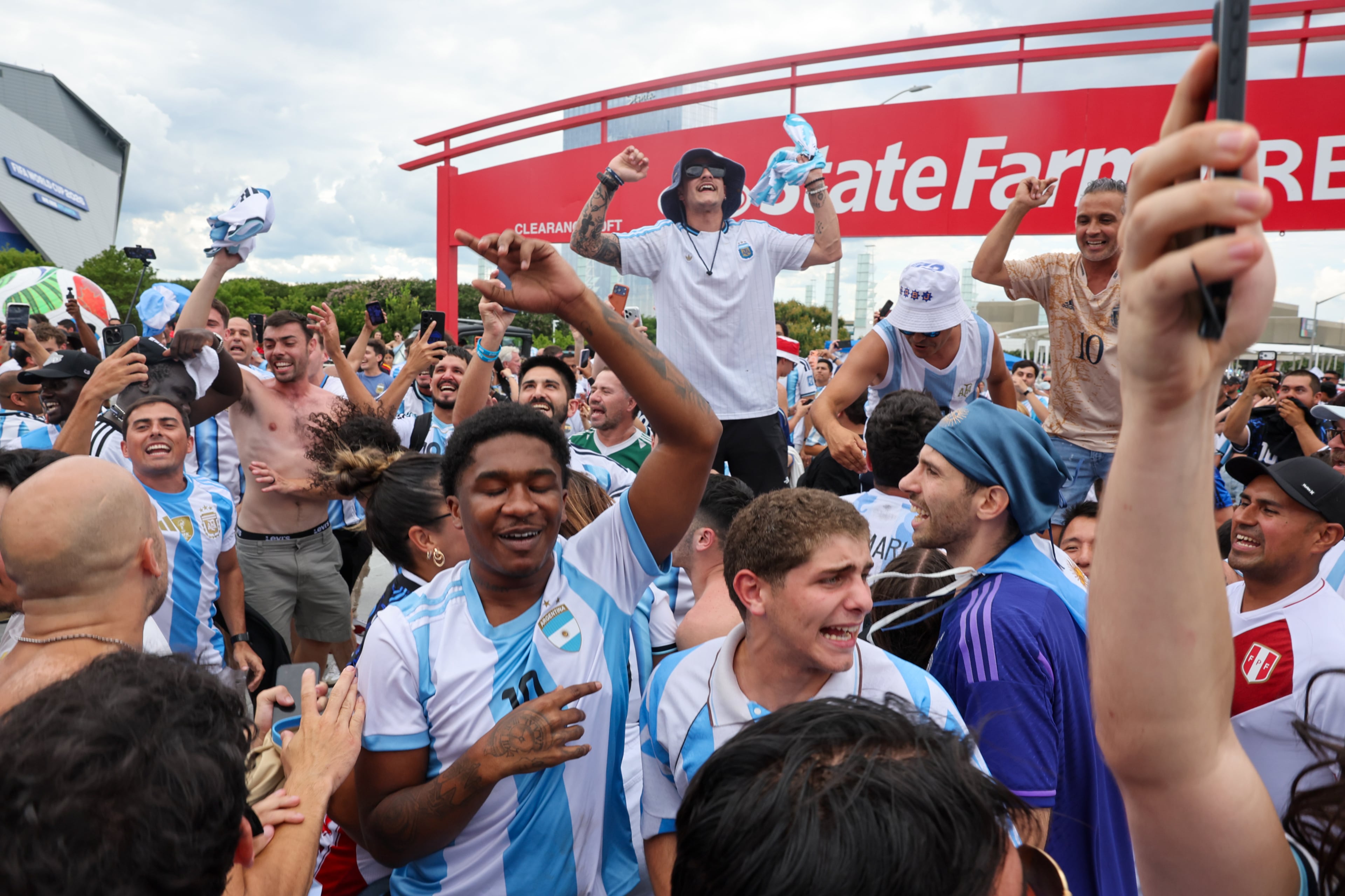 Argentina fans celebrate outside Atlanta Stadium (Mercedes-Benz Stadium) after Argentina wins the FIFA World Cup game between England and Argentina in Atlanta on July 15, 2026. It’s the last game Atlanta is hosting. Argentina won 2-1. (Arvin Temkar/AJC)