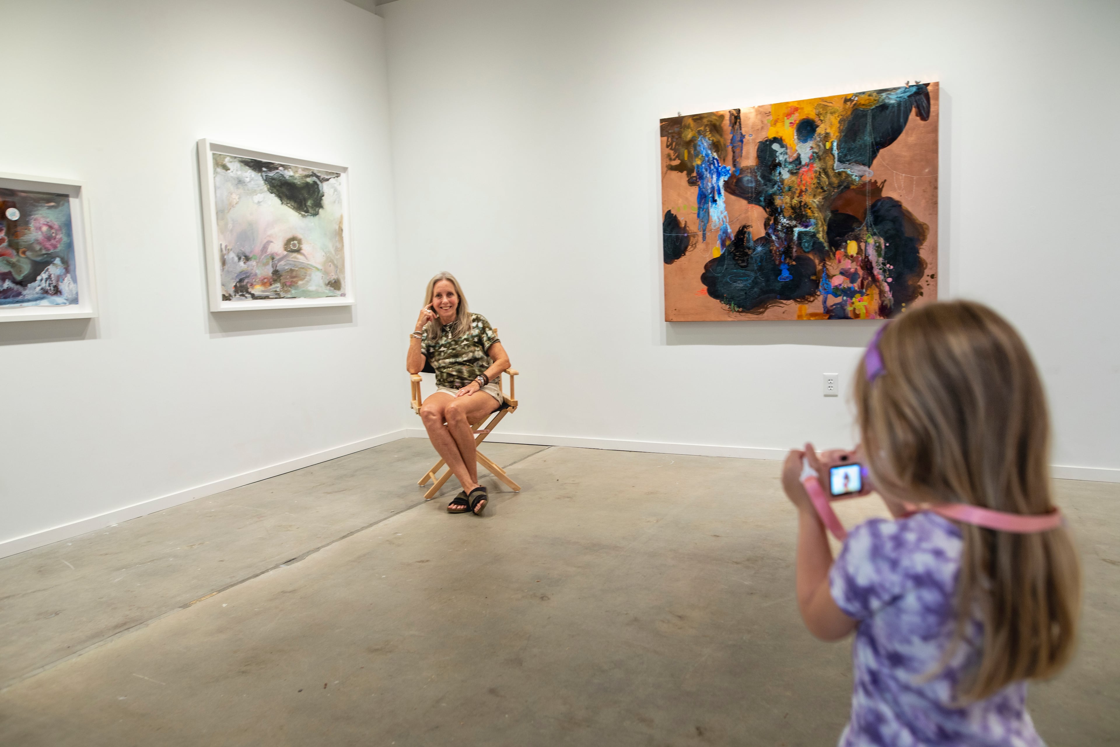 Pam Longobardi is photographed in front of her installation by a young photographer at Sandler Hudson Gallery. A deep and lasting love for the environment has long been at the heart of Longobardi’s artistic practice. (Courtesy of Isadora Pennington)