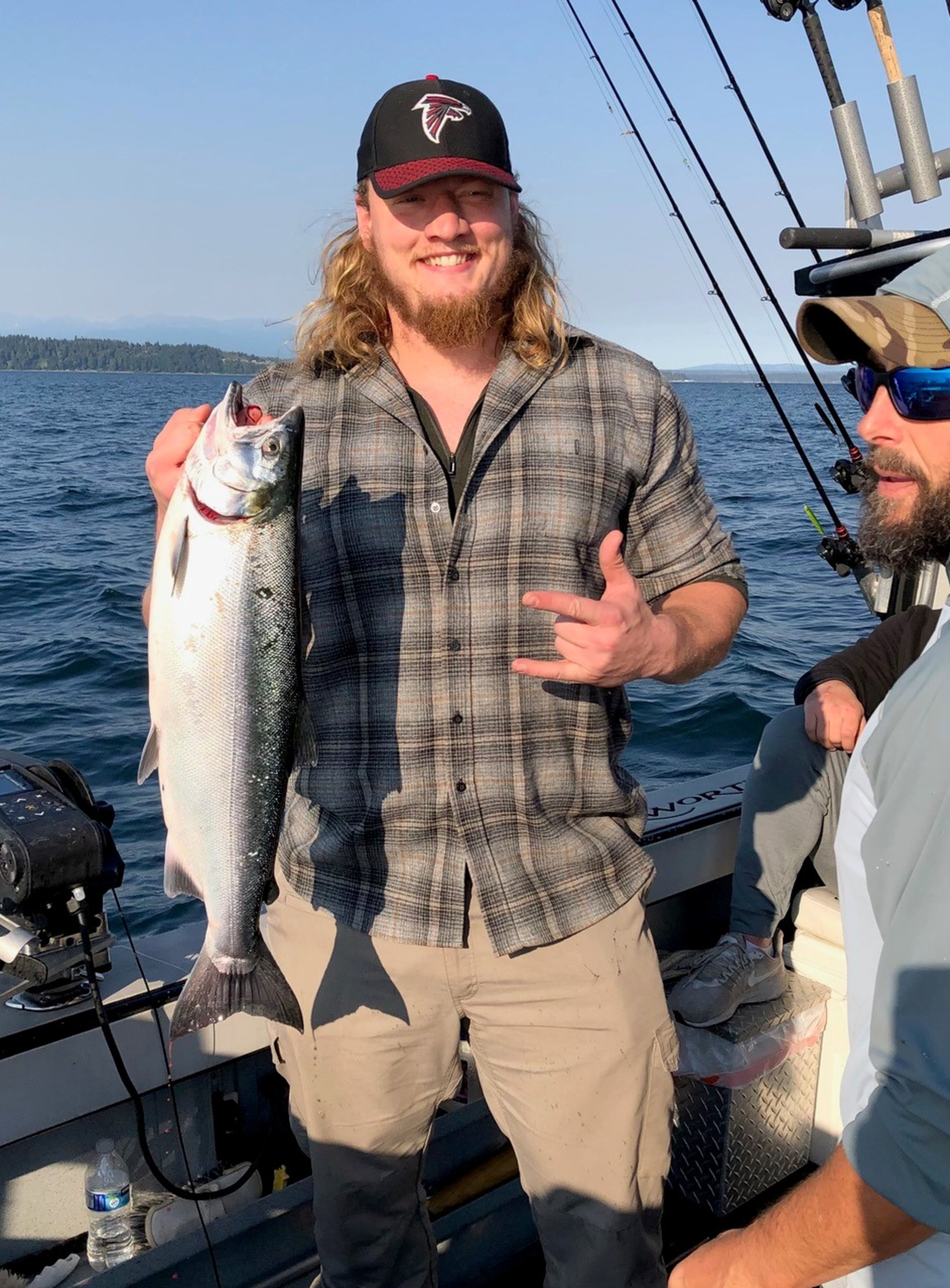 Falcons offensive lineman Kaleb McGary coordinated a day of salmon fishing for the team during Tuesday's off day in Seattle.