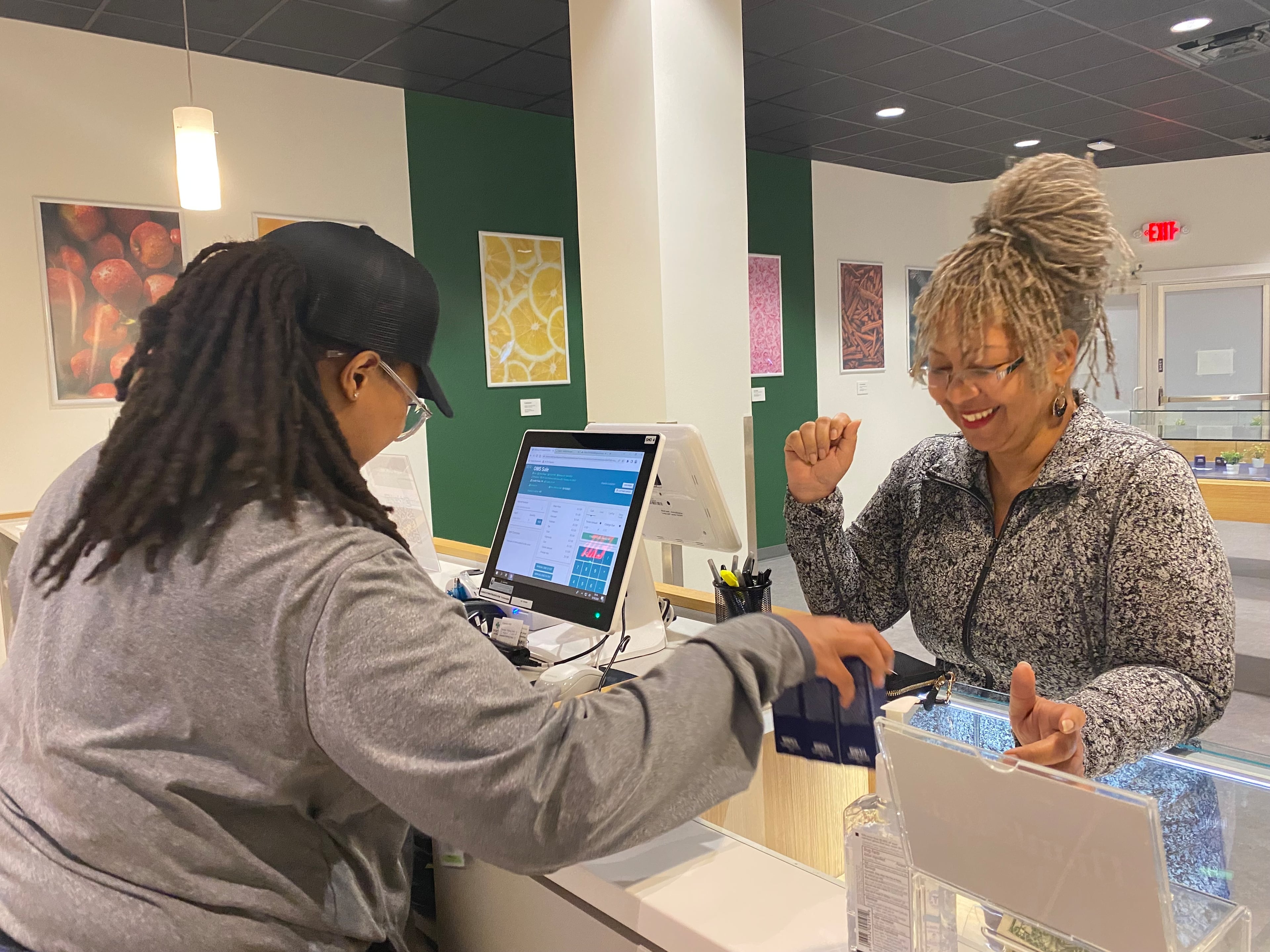 In this file photo, Sylvia Hayes, 60, started her quest to get certified and get a low-THC card late last year, wanting to have it ready once the medical dispensaries opened up in April of last year. (Helena Oliviero helena.oliviero@ajc.com)