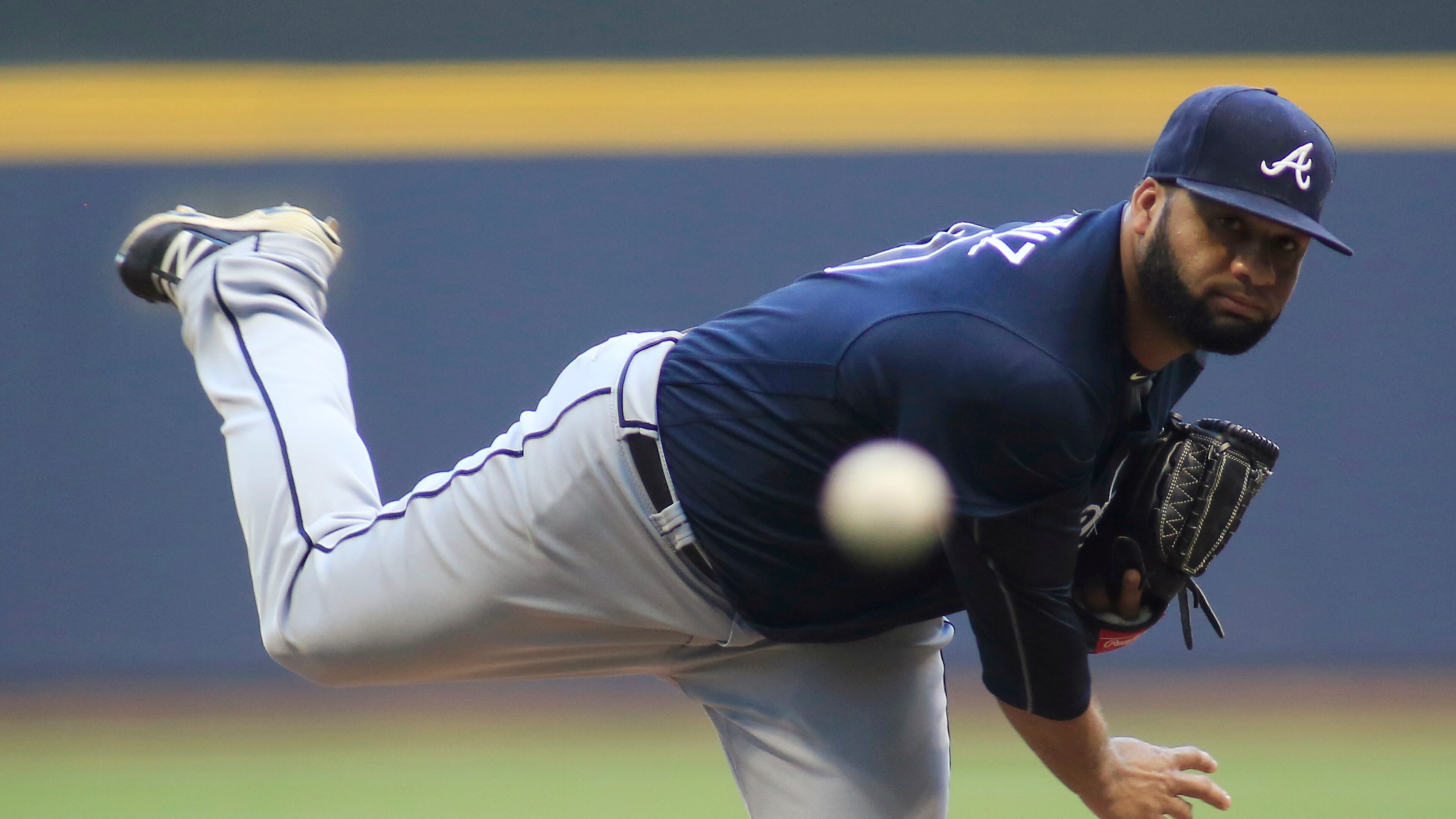 Atlanta Braves pitcher Joel De La Cruz throws to a Milwaukee Brewers batter during the first inning of a baseball game Wednesday, Aug. 10, 2016, in Milwaukee. (AP Photo/Darren Hauck)