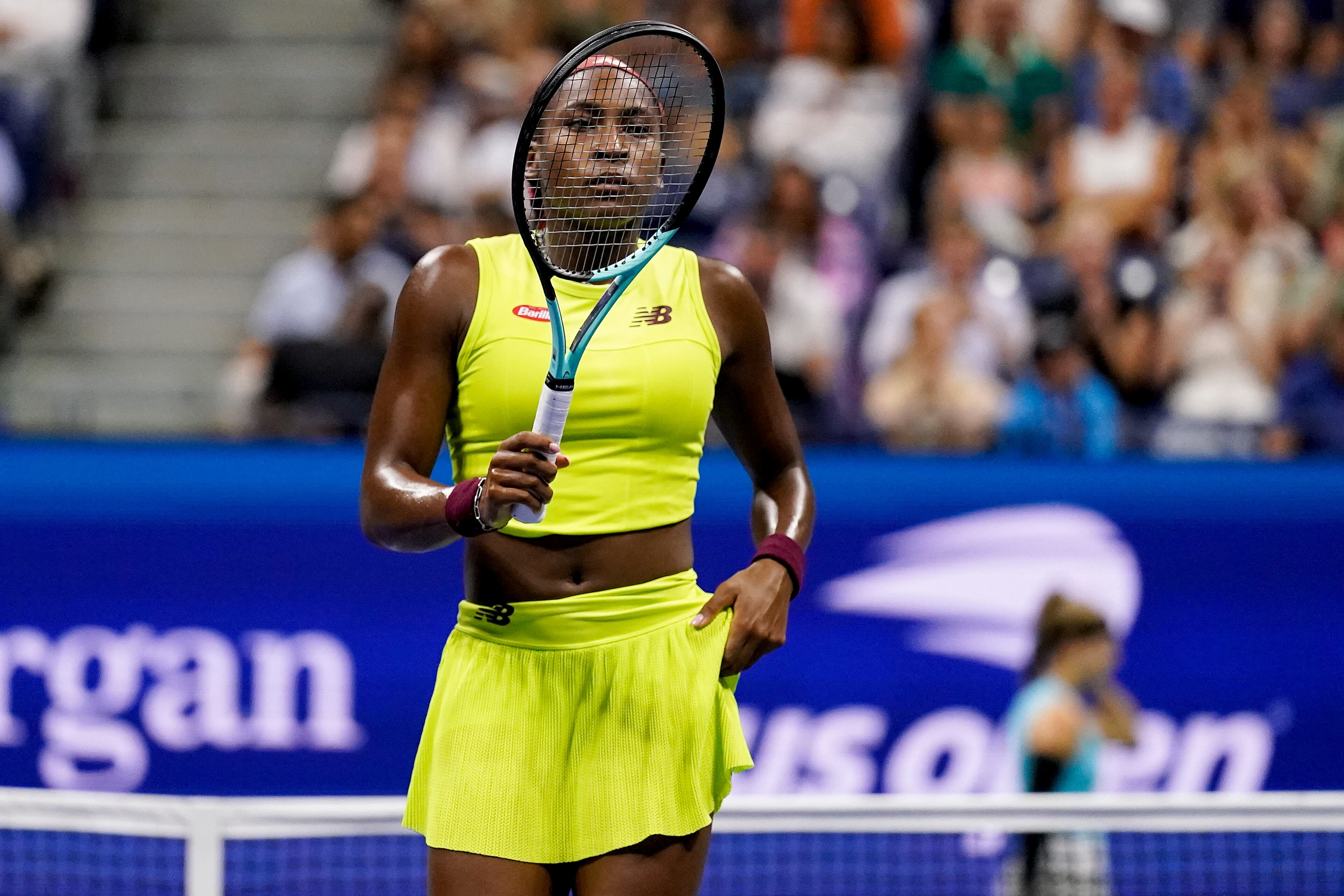 Coco Gauff, of the United States, walks back to the service line to serve against Karolina Muchova, of the Czech Republic, during the women's singles semifinals of the U.S. Open tennis championships, Thursday, Sept. 7, 2023, in New York. (AP Photo/Charles Krupa)