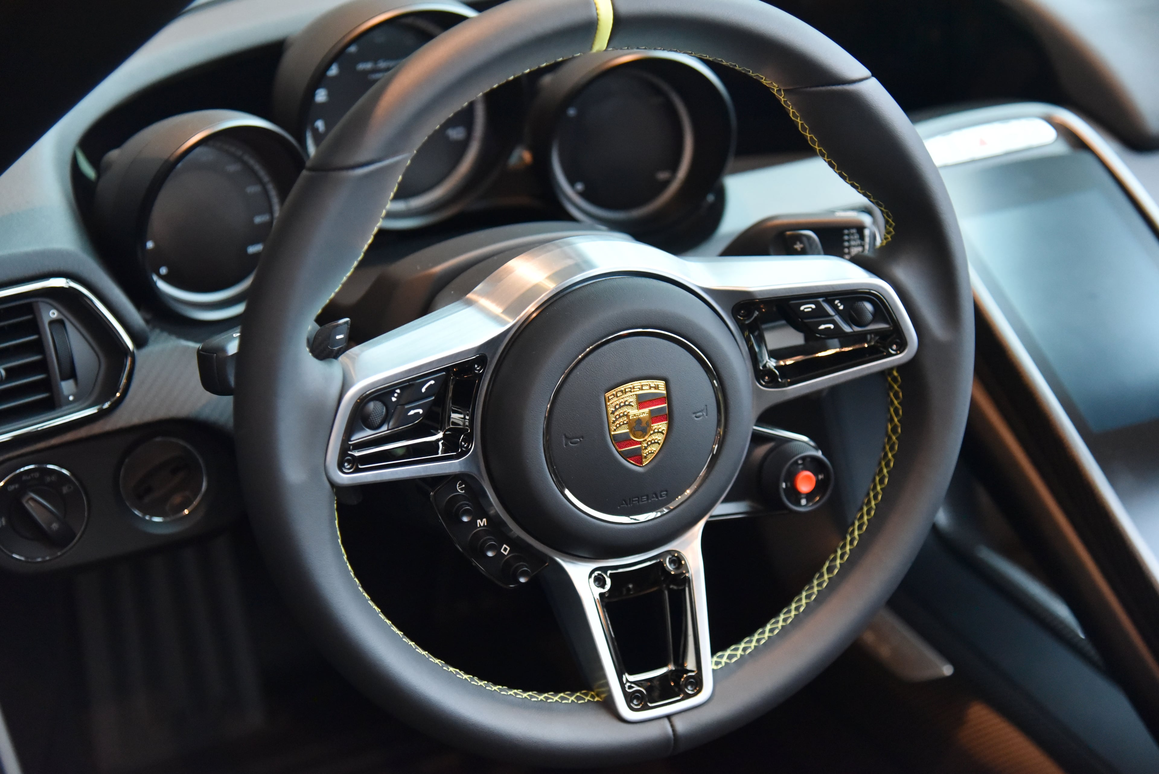 October 26, 2018 Atlanta - Lot #185 - 2015 Porsche 918 Spyder - is displayed at the Porsche Experience Center Atlanta on Friday, October 26, 2018. RM Sotheby's, in collaboration with the Porsche Experience Center Atlanta, is delighted to announce The Porsche 70th Anniversary Auction, an exclusive, single-marque auction to be held at the ground-breaking home of Porsche Cars North America (PCNA) in Atlanta. Set for the weekend of 27 October, the sale shortly follows official U.S. 70th anniversary celebrations taking place as part of Porsche Rennsport Reunion VI and will feature approximately 70 of the world's most important and most sought-after collectible Porsche models, spanning the marque's illustrious 70-year history as a sports car manufacturer. HYOSUB SHIN / HSHIN@AJC.COM