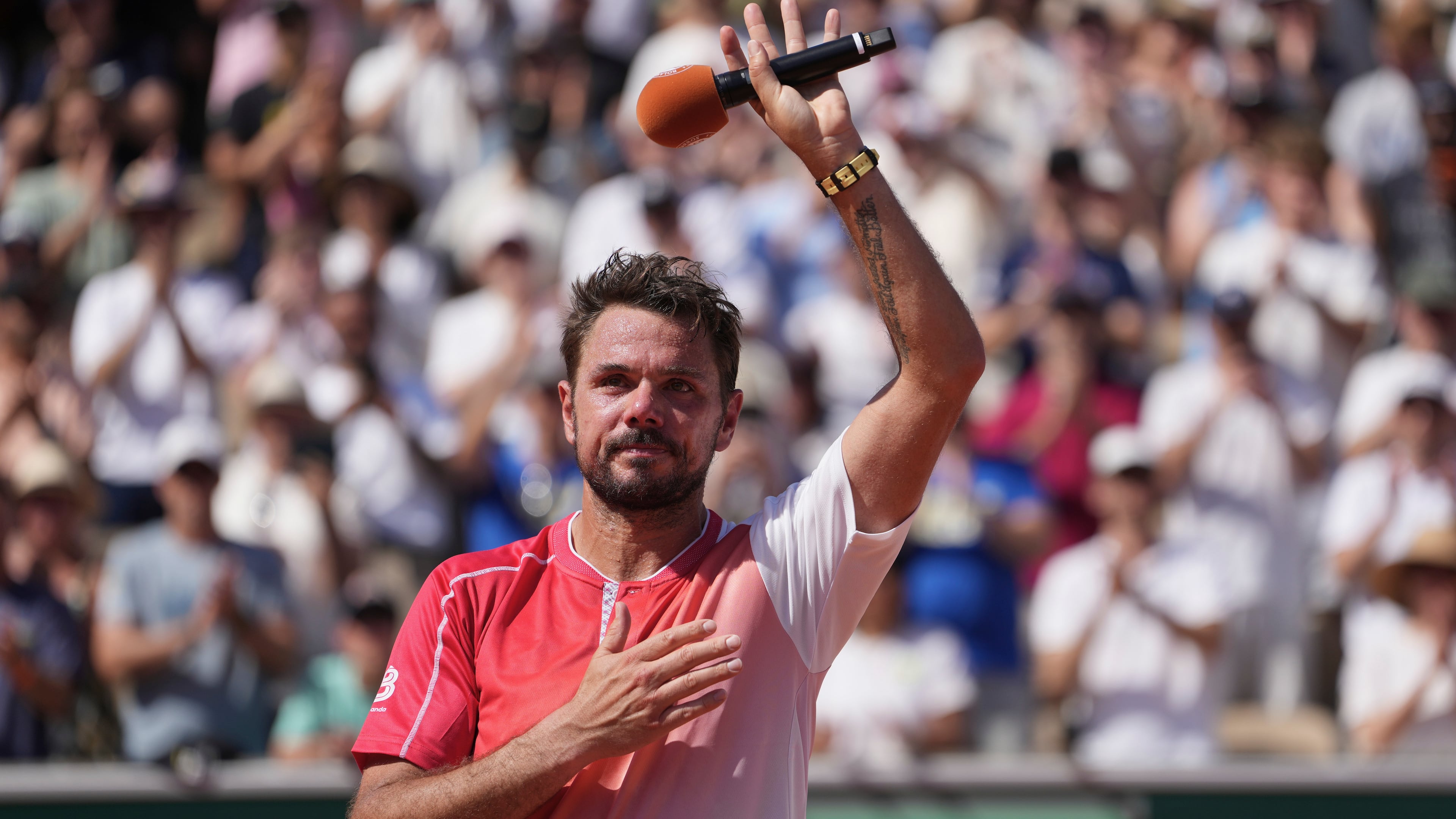 Stan Wawrinka of Switzerland reacts after the first round men's singles tennis match against Jesper De Jong of the Netherlands at the French Open tennis tournament in Paris, Monday, May 25, 2026. (AP Photo/Thibault Camus)
