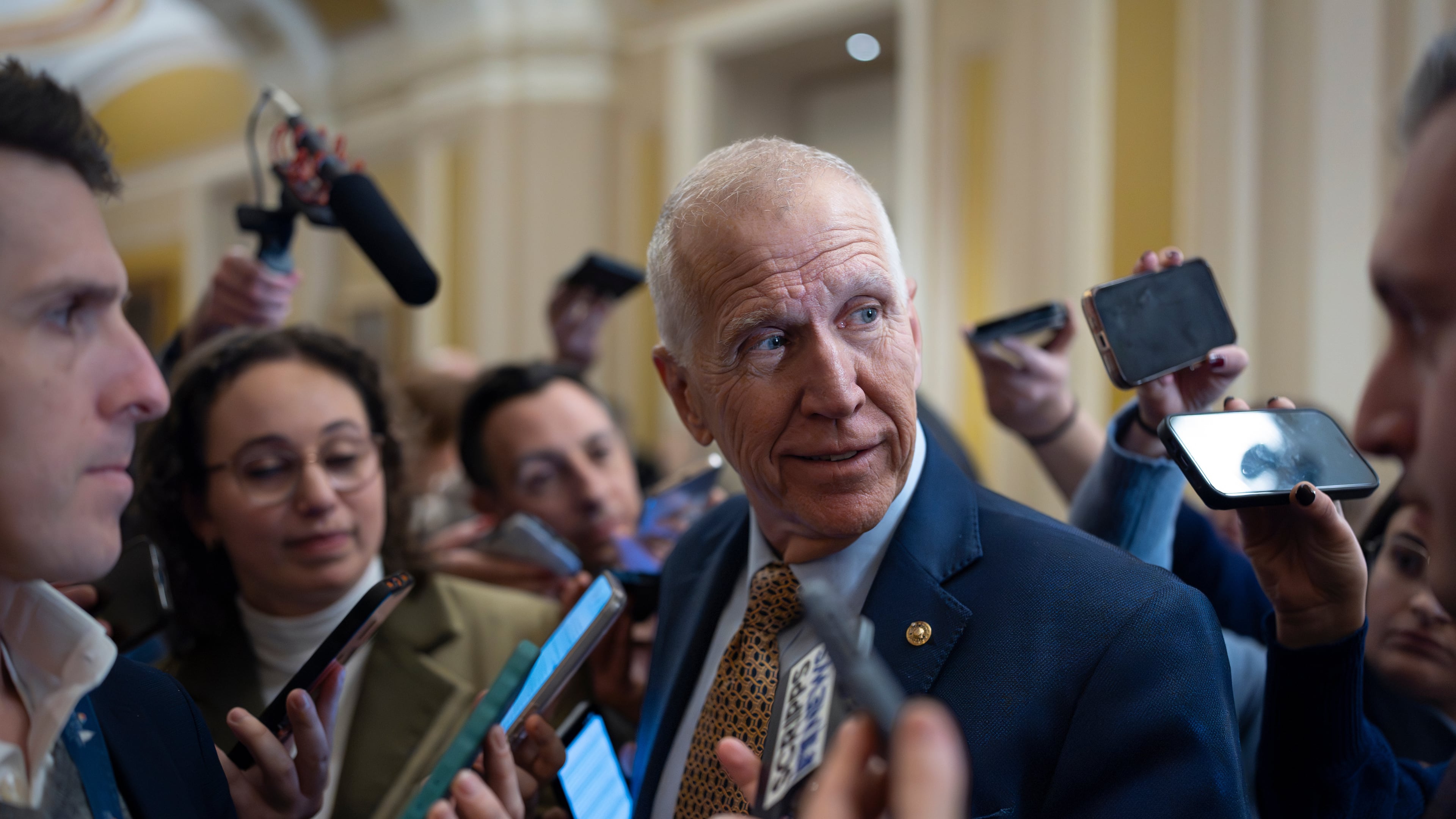 Sen. Thom Tillis, R-N.C., speaks with reporters following a closed-door meeting with fellow Republicans on spending legislation that funds the Department of Homeland Security and a swath of other government agencies, at the Capitol in Washington, Wednesday, Jan. 28, 2026. (AP Photo/J. Scott Applewhite)