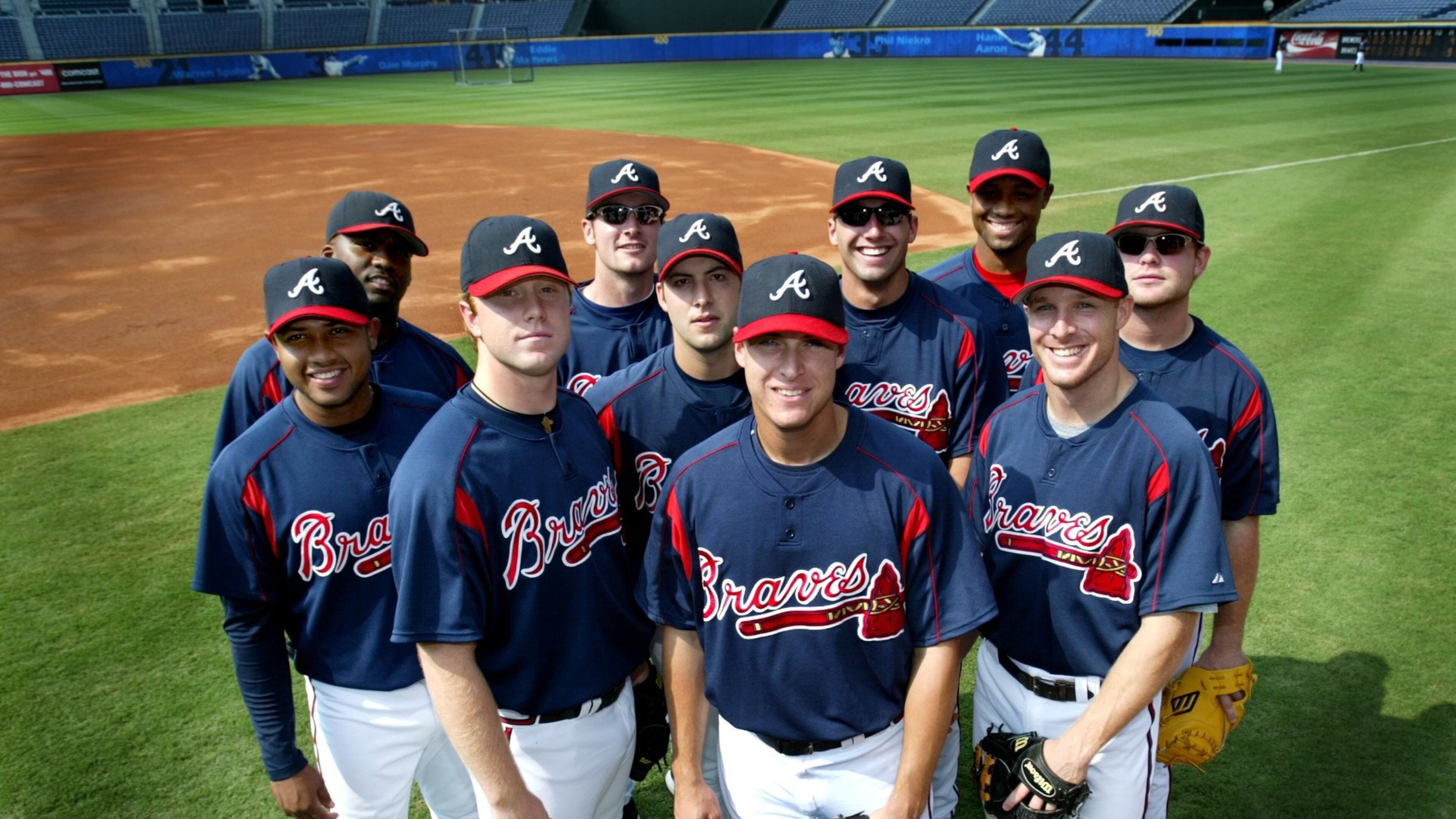 These players were among the Baby Braves in 2005: (left to right, front row: Andy Marte, Blaine Boyer, Kyle Davies (in middle), Kelly Johnson (center front), Pete Orr (far right), back row: Wilson Betemit, Ryan Langerhans (sunglasses), Jeff Francoeur (also w/sunglasses), Roman Colon (black man in back) and Brian McCann (sunglasses) on far right. (KEITH HADLEY/AJC file)