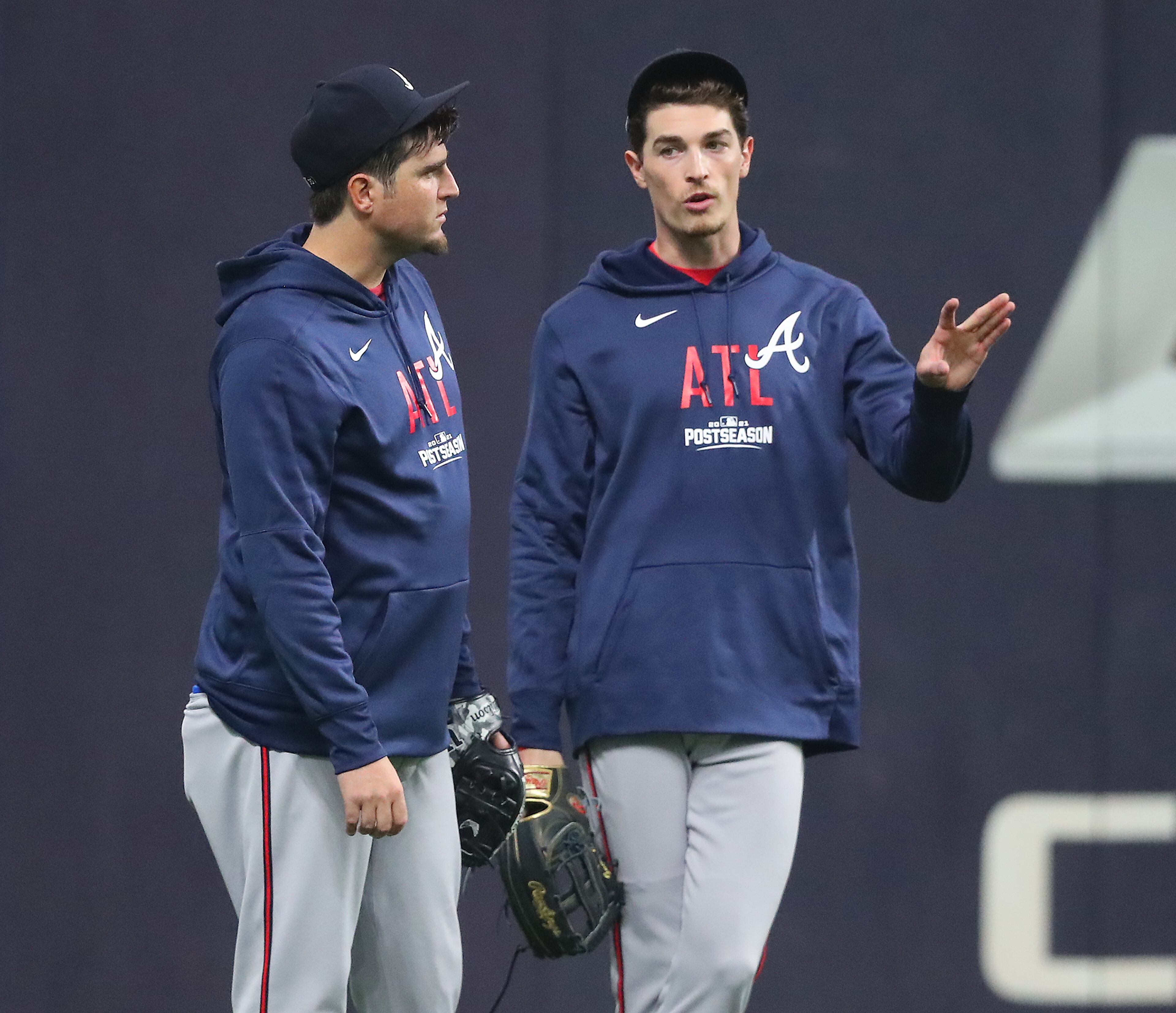 Braves game two starter Max Fried (right) confers with a teammate during practice at American Family Field preparing for the opening game of the National League Division Series against the Milwaukee Brewers on Thursday, Oct. 7, 2021, in Milwaukee. “Curtis Compton / Curtis.Compton@ajc.com”