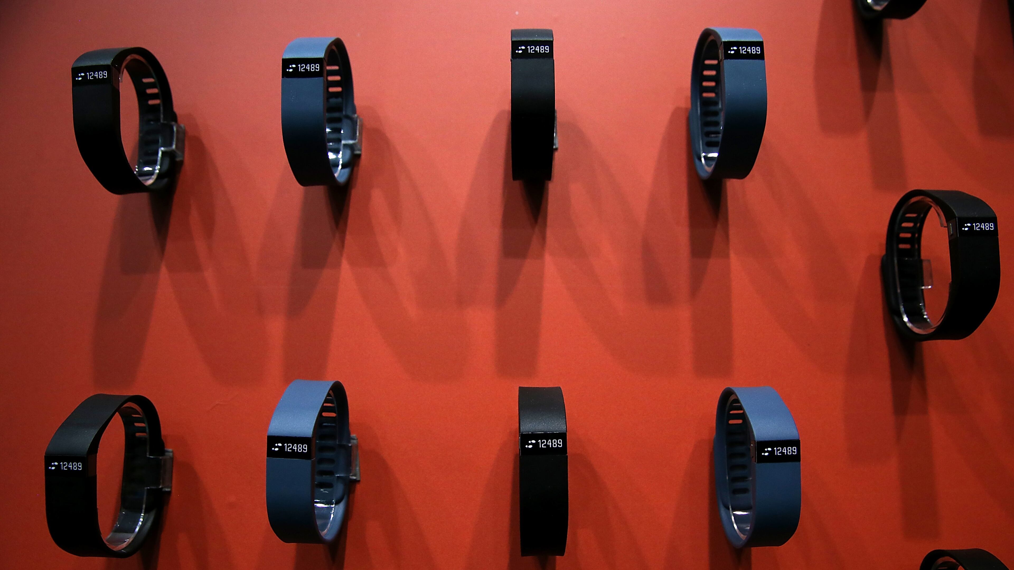 LAS VEGAS, NV - JANUARY 07: The Fitbit Force is displayed in the Fitbit booth at the 2014 International CES at the Las Vegas Convention Center on January 7, 2014 in Las Vegas, Nevada. CES, the world's largest annual consumer technology trade show, runs through January 10 and is expected to feature 3,200 exhibitors showing off their latest products and services to about 150,000 attendees. (Photo by Justin Sullivan/Getty Images)