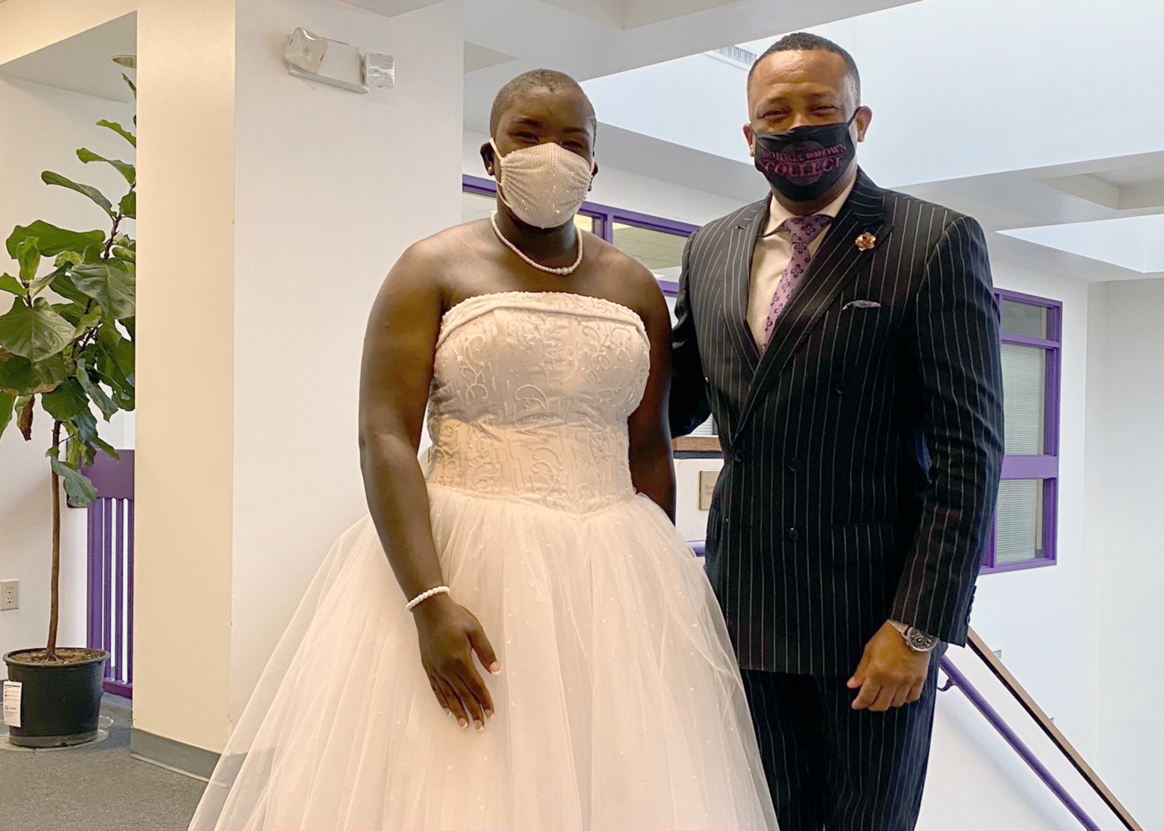 Morris Brown College student Jacqueline Flournoy poses with college President Kevin James in October during homecoming weekend. Flournoy was crowned Miss Morris Brown College. Flournoy, the student government association president, has dreamed of studying there since she was 9. (Courtesy of Jacqueline Flournoy)