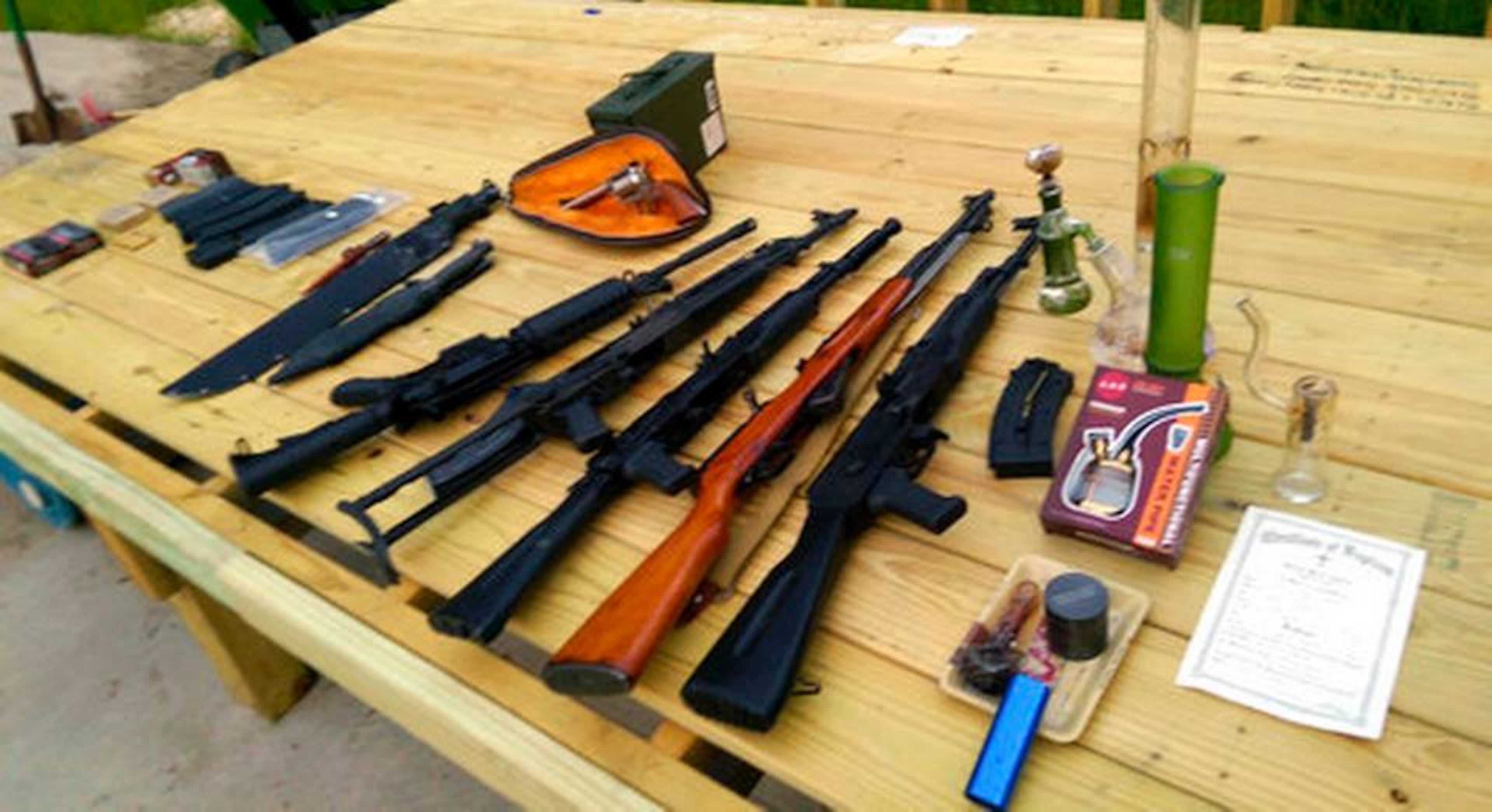 A U.S. district court released this photo of guns found at the home of Dr. Bryan Moles.