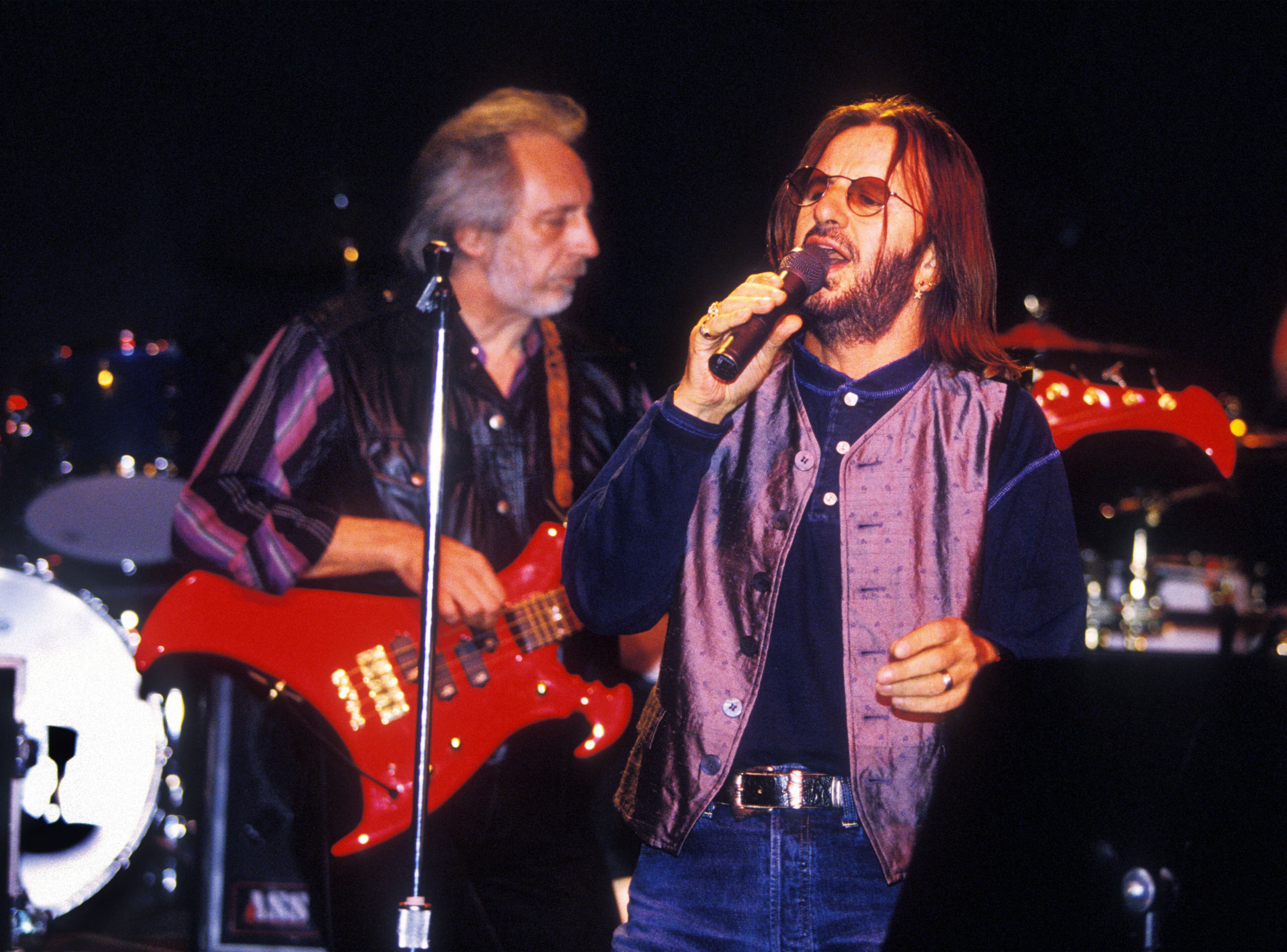 VANCOUVER, CANADA: John Entwistle plays with the Ringo Starr in the summer of 1995 in Vancouver, Candada. Entwistle died June 27, 2002. (Photo by Jeff Vinnick/Getty Images)
