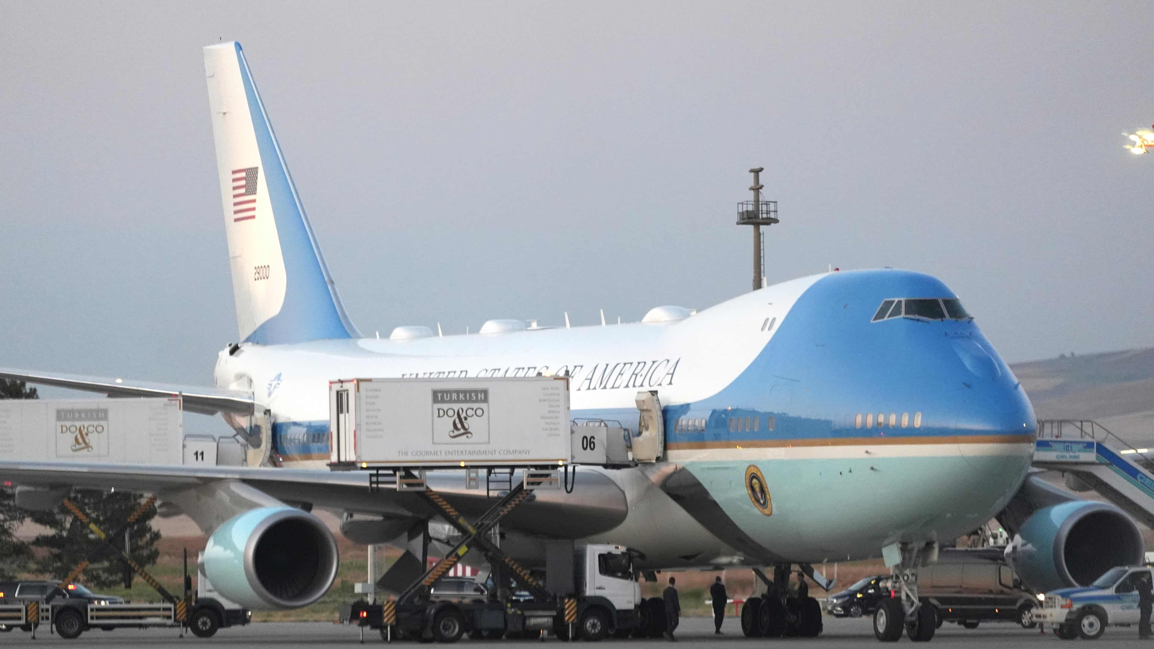 Catering trucks are parked at Air Force One on the tarmac as the motorcade carrying U.S. President Donald Trump arrives on the tarmac to depart following the NATO summit at Ankara International Airport in Ankara, Turkey, Wednesday, July 8, 2026. (AP Photo/Alex Brandon)