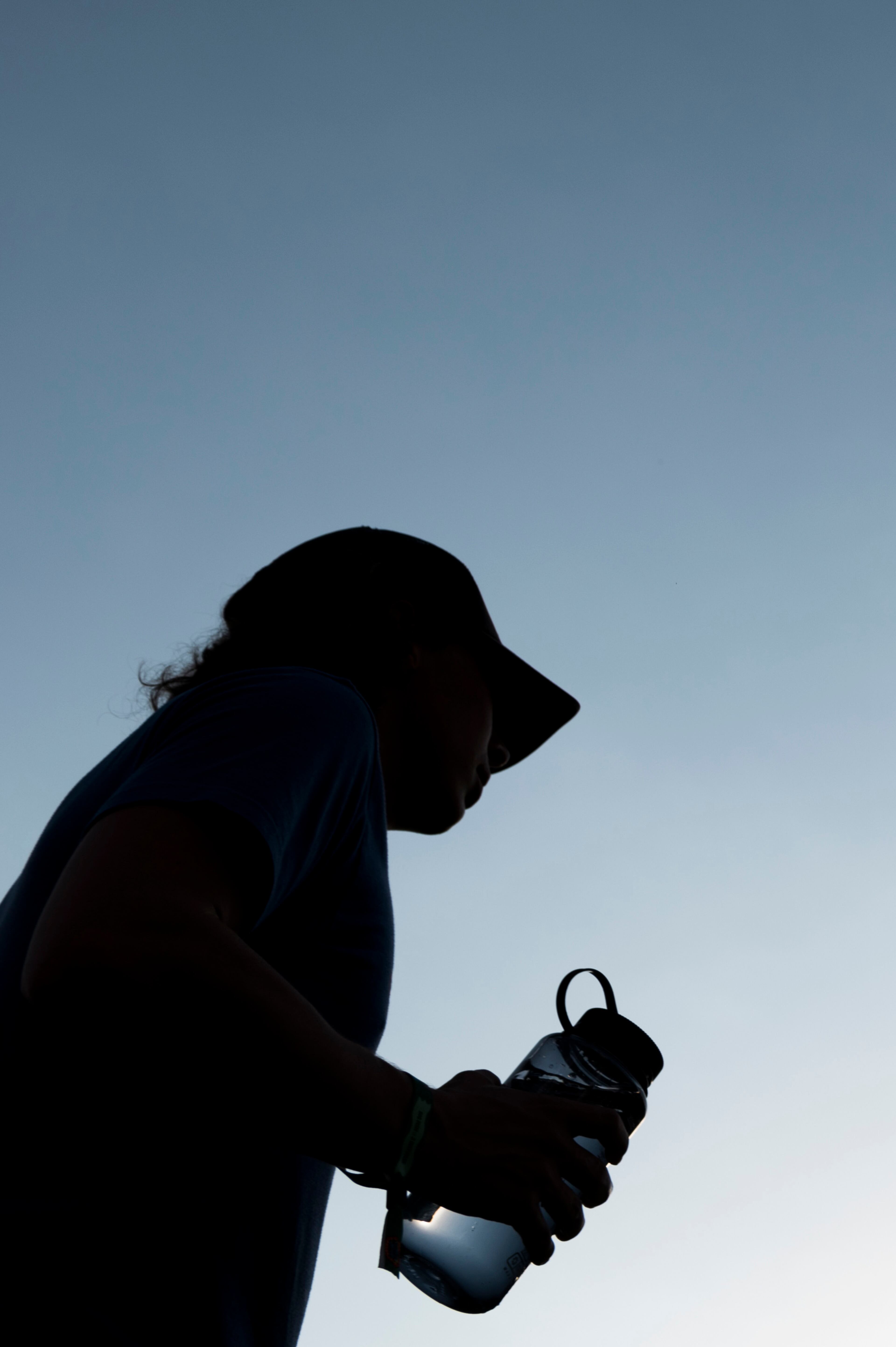 April 21, 2017, Atlanta - A festival goer carries a water bottle as the sun goes down during the SweetWater 420 Fest at Centennial Olympic Park in Atlanta, Georgia, on Friday, April 21, 2017. (DAVID BARNES / DAVID.BARNES@AJC.COM)