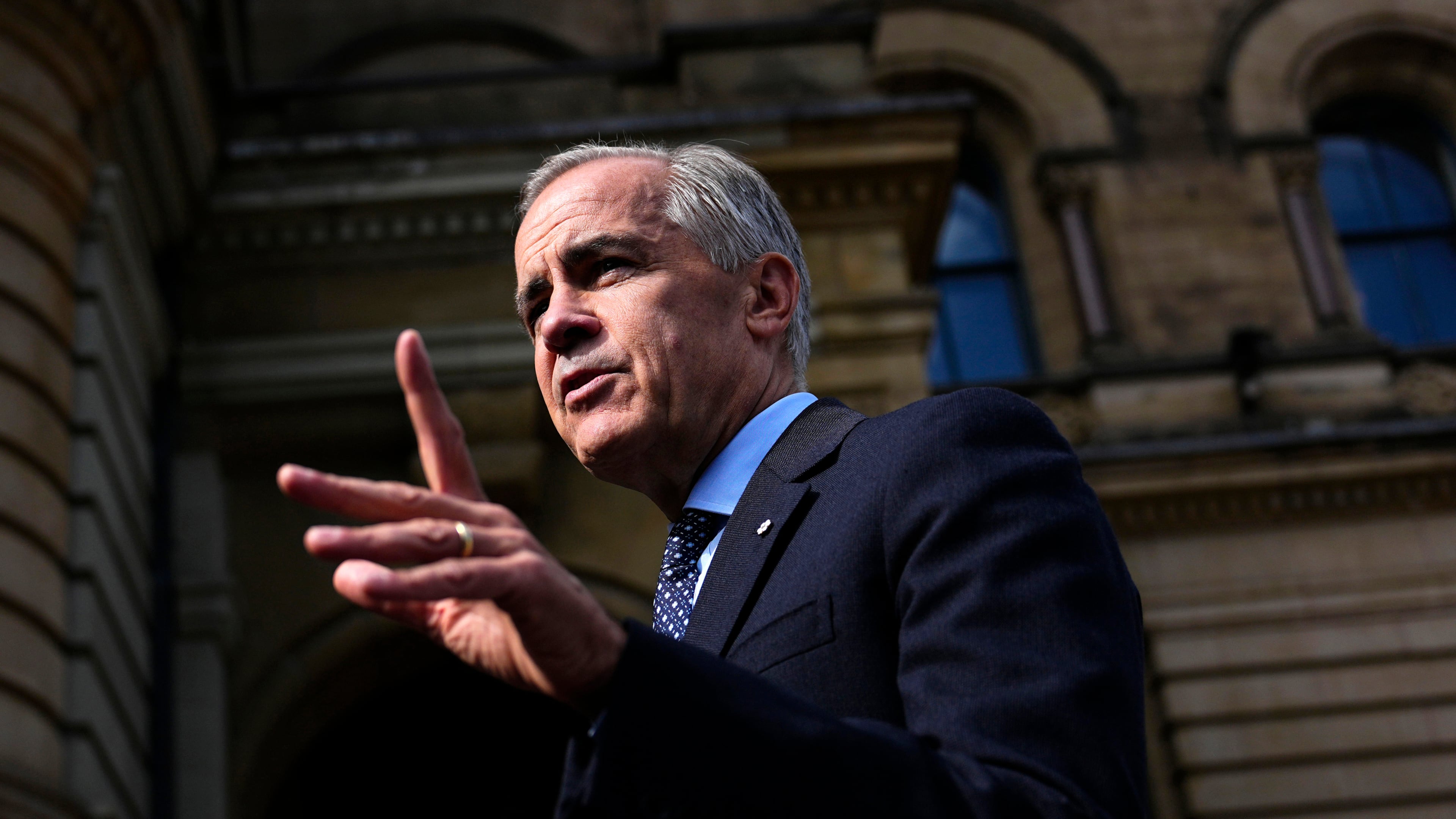 Canadian Prime Minister Mark Carney speaks with members of the media as he arrives at the Office of the Prime Minister and Privy Council in Ottawa, on Tuesday, Sept. 1, 2026. (Justin Tang/The Canadian Press via AP)