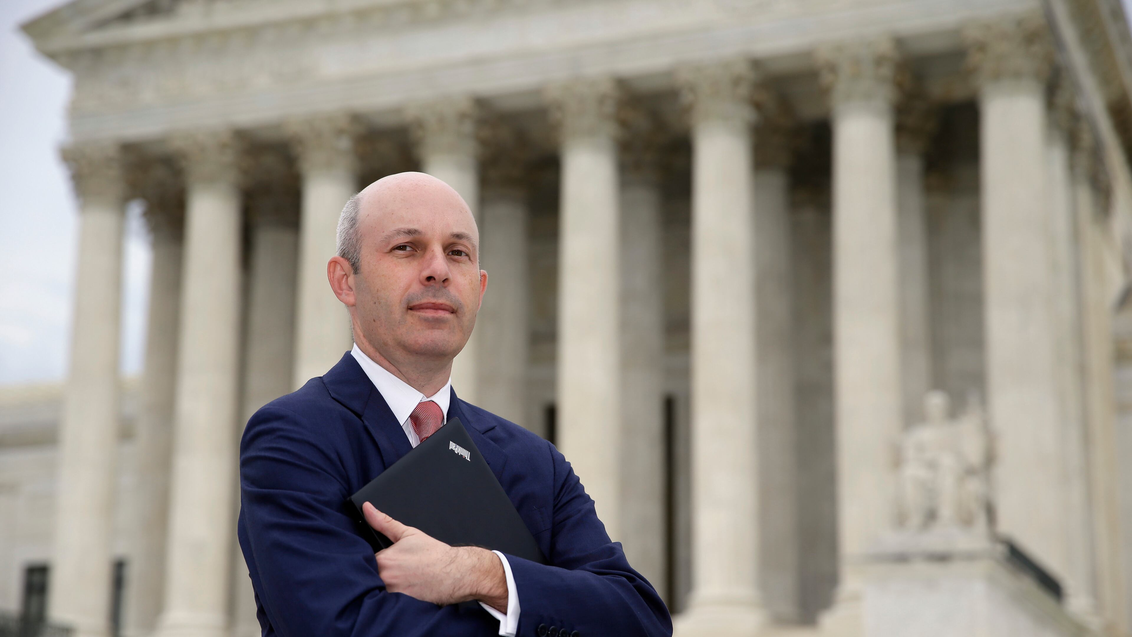 FILE - Tom Goldstein, who writes SCOTUSblog.com, poses for a photograph in front of the Supreme Court, Oct. 31, 2013, in Washington. (AP Photo/Alex Brandon, file)