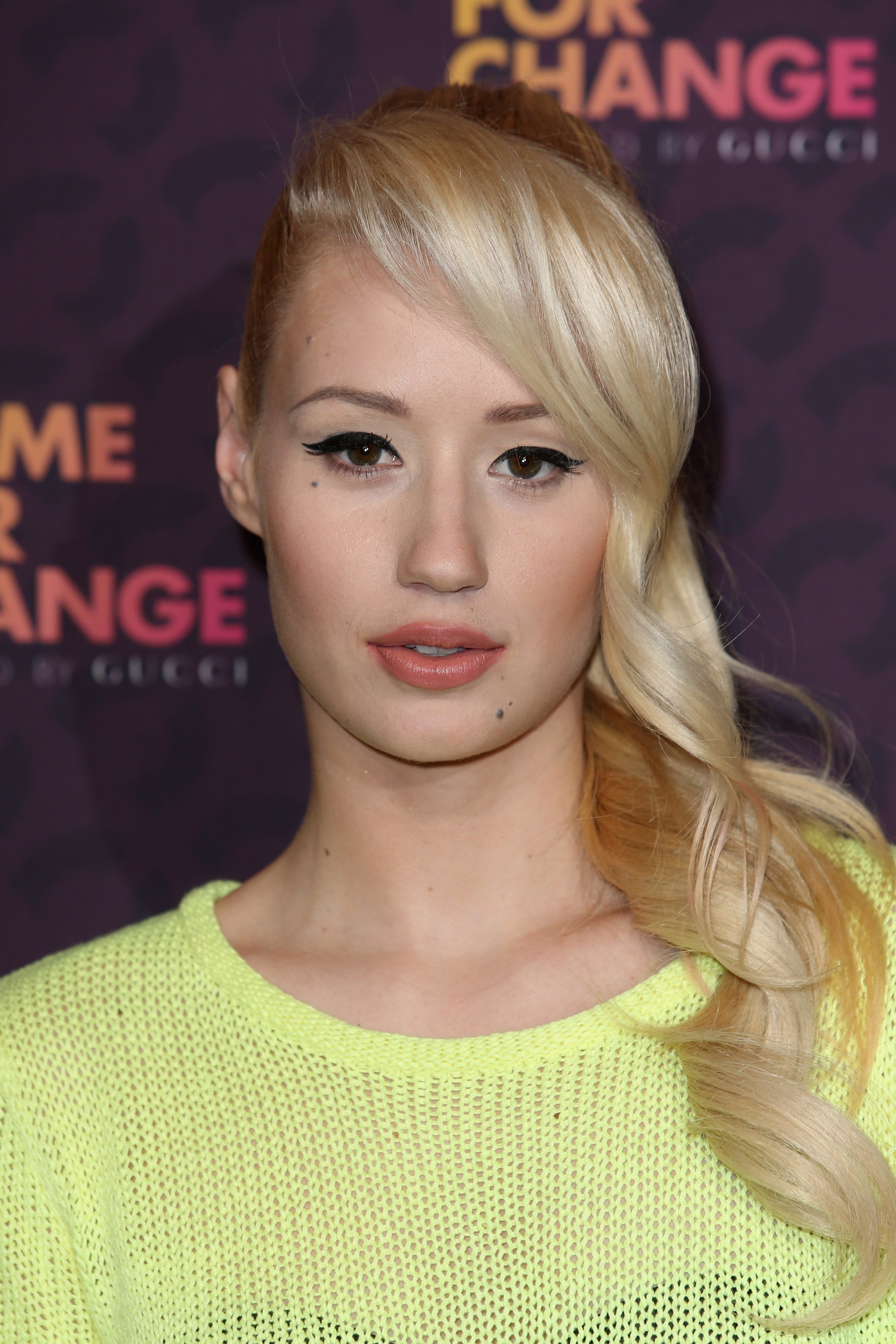 LONDON, ENGLAND - JUNE 01: Singer Iggy Azalea poses backstage in the media room at the "Chime For Change: The Sound Of Change Live" Concert at Twickenham Stadium on June 1, 2013 in London, England. Chime For Change is a global campaign for girls' and women's empowerment founded by Gucci with a founding committee comprised of Gucci Creative Director Frida Giannini, Salma Hayek Pinault and Beyonce Knowles-Carter. (Photo by Tim P. Whitby/Getty Images for Gucci)