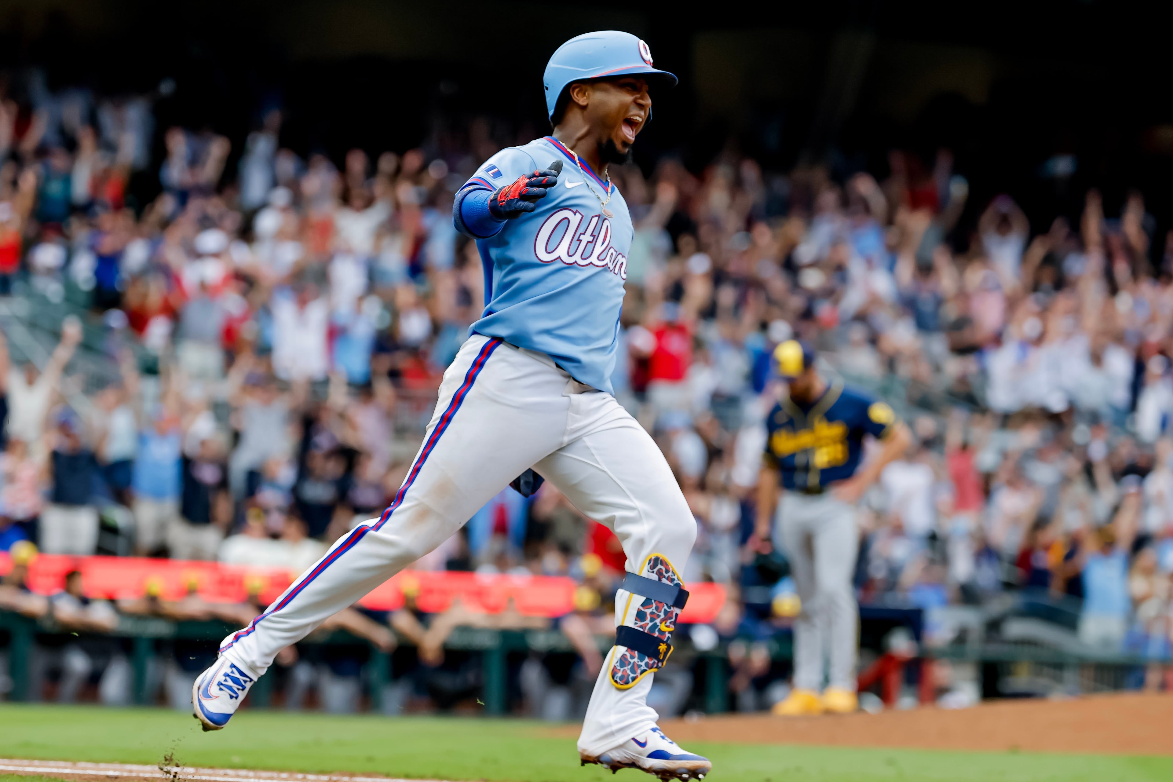 Ozzie Albies celebrates his walk-off two-run homer against the Brewers last weekend. (Erik S. Lesser/AP)