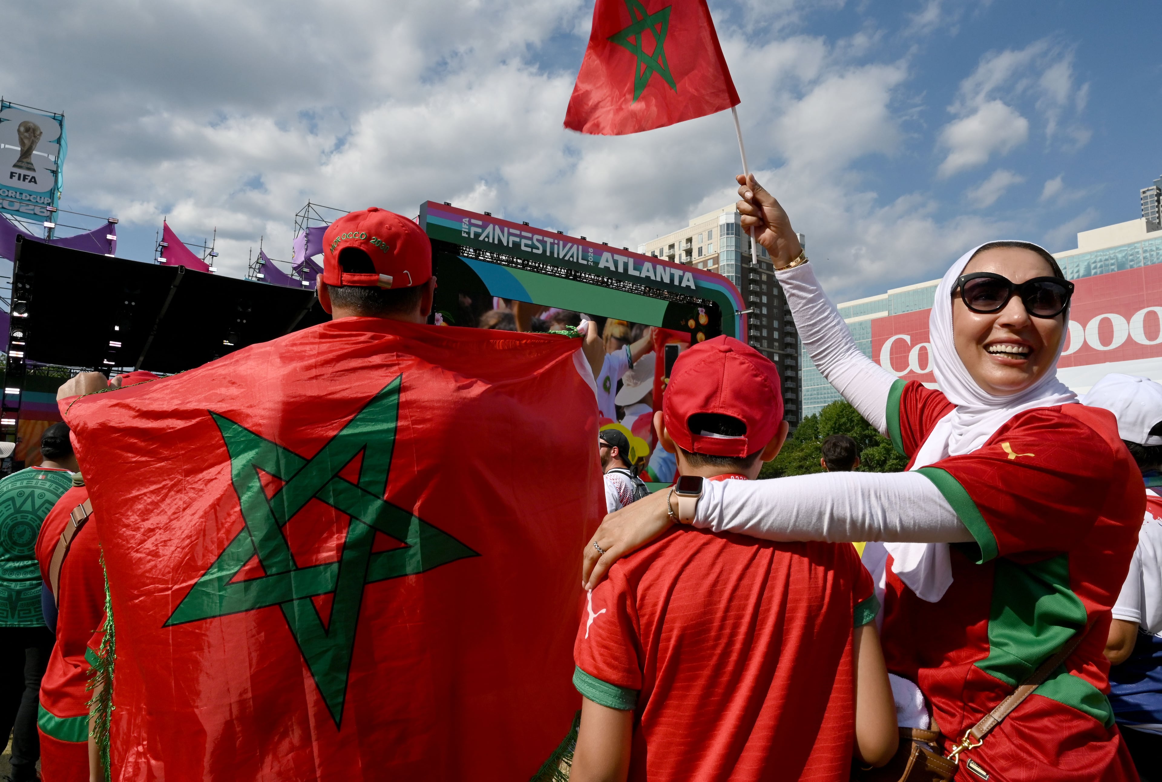Morocco fans cheer as they gather to watch the match between Morocco vs. Haiti at the FIFA Fan Festival in Centennial Olympic Park on Wednesday, June 24, 2026, in Atlanta. (Hyosub Shin/AJC)