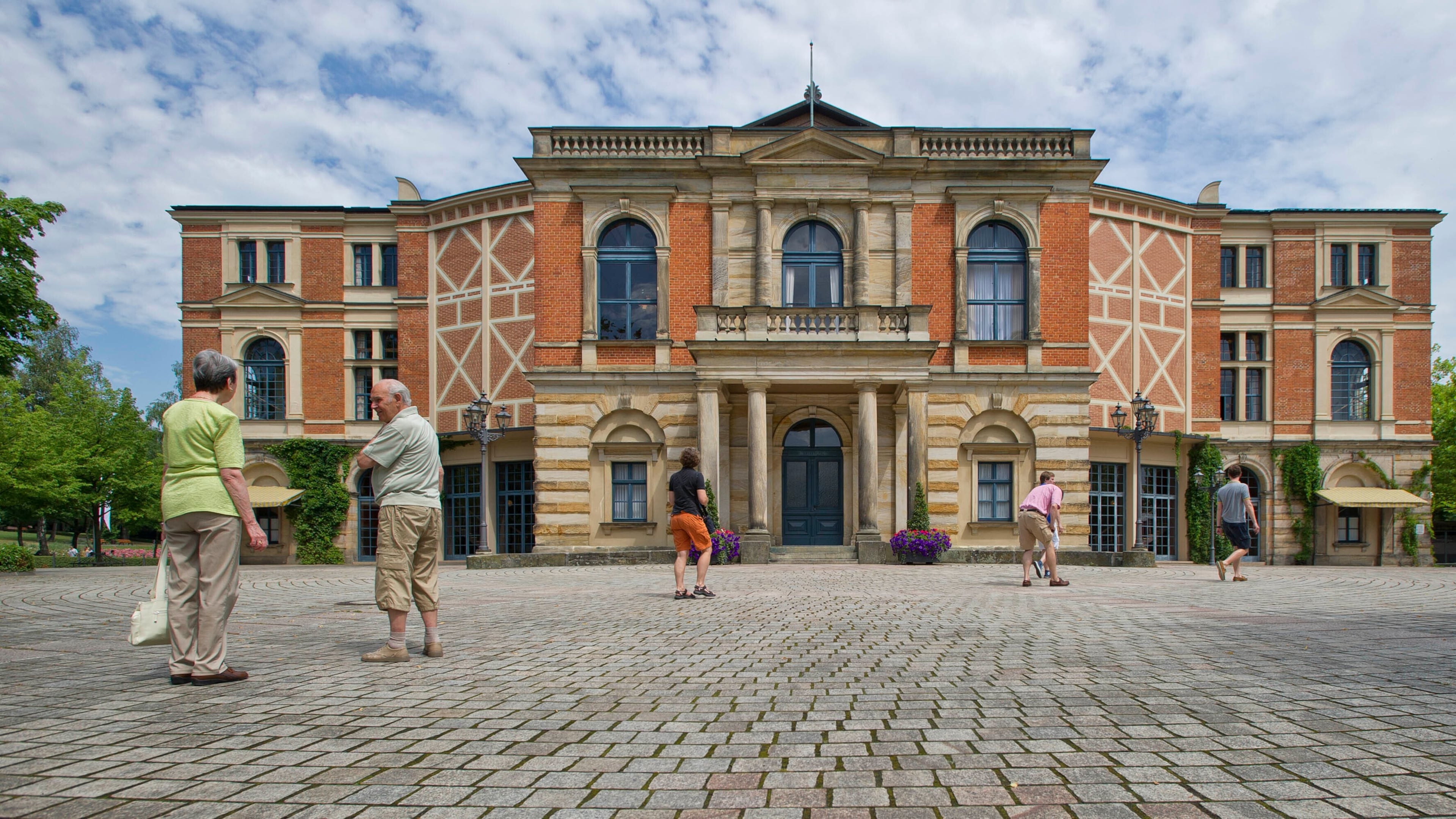 FILE - Visitors walk the grounds of the festival opera house "Festspielhaus" in Bayreuth, southern Germany, on July 17, 2010. (Eckehard Schulz/DAPD via AP)