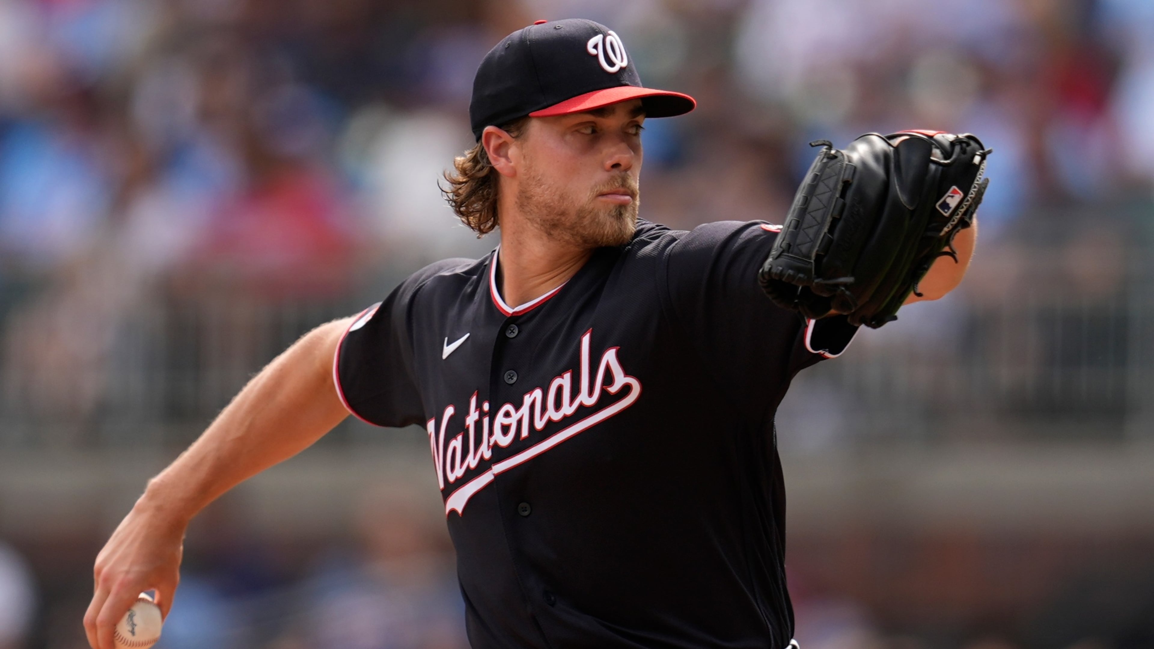Washington Nationals pitcher Jake Irvin works in the first inning of a baseball game against the Atlanta Braves, Saturday, May 23, 2026, in Atlanta. (AP Photo/Mike Stewart)