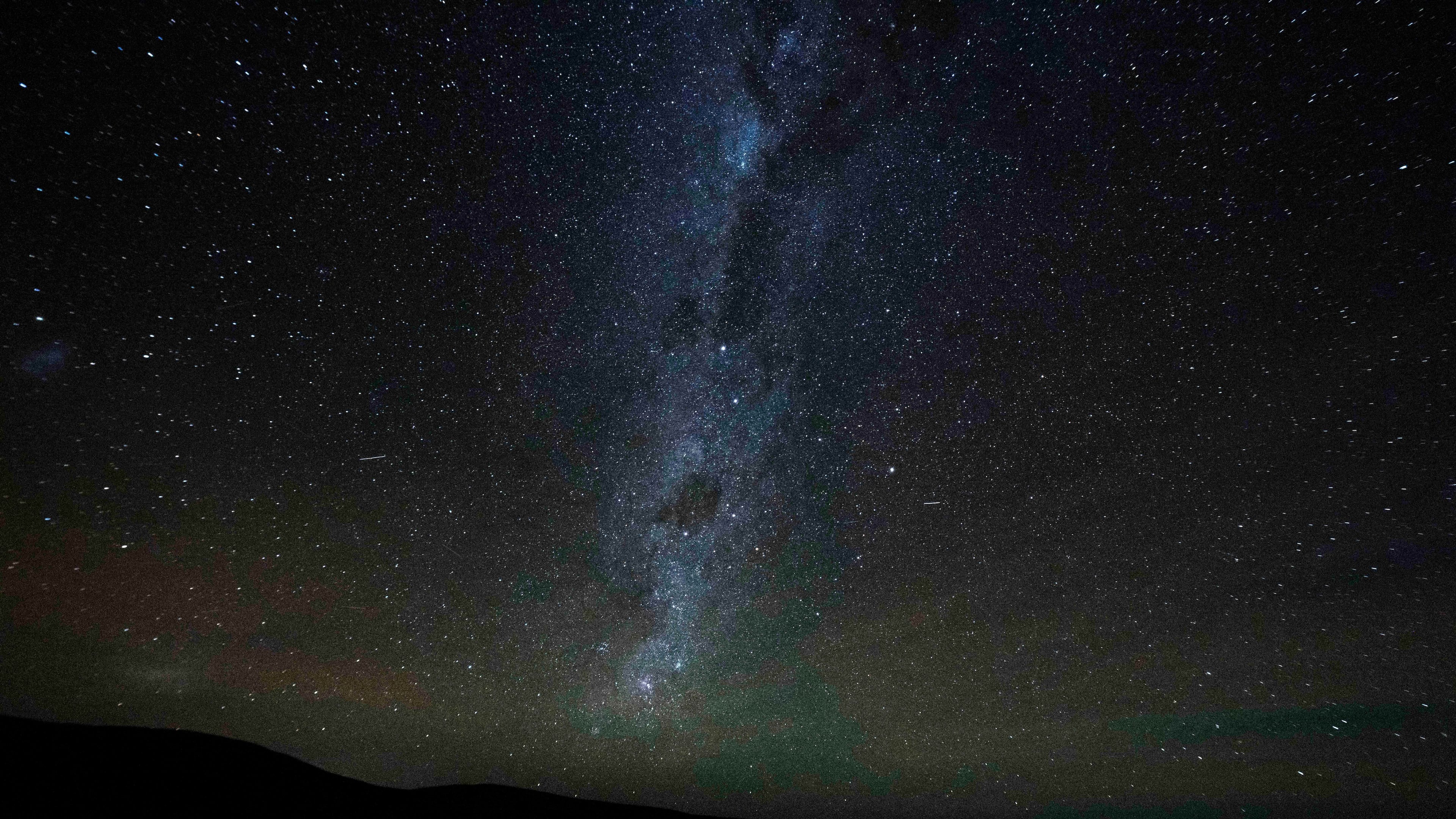 The Milky Way stretches across the night sky as seen from the Atacama Desert, Chile, Wednesday, April 15, 2026. (AP Photo/Esteban Felix)