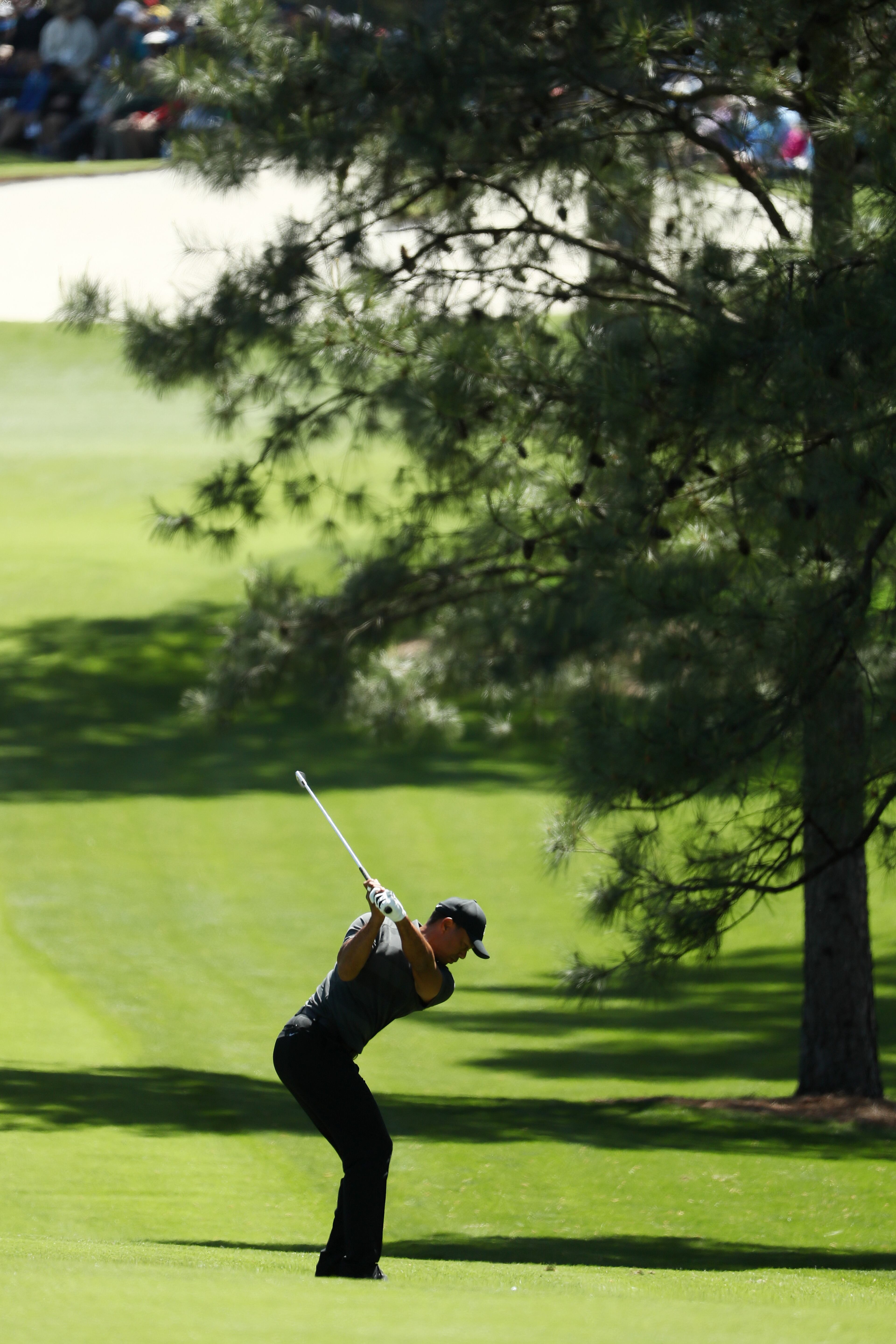 AUGUSTA, GA - APRIL 05: Tiger Woods of the United States plays his second shot on the seventh hole during the first round of the 2018 Masters Tournament at Augusta National Golf Club on April 5, 2018 in Augusta, Georgia. (Photo by Jamie Squire/Getty Images)