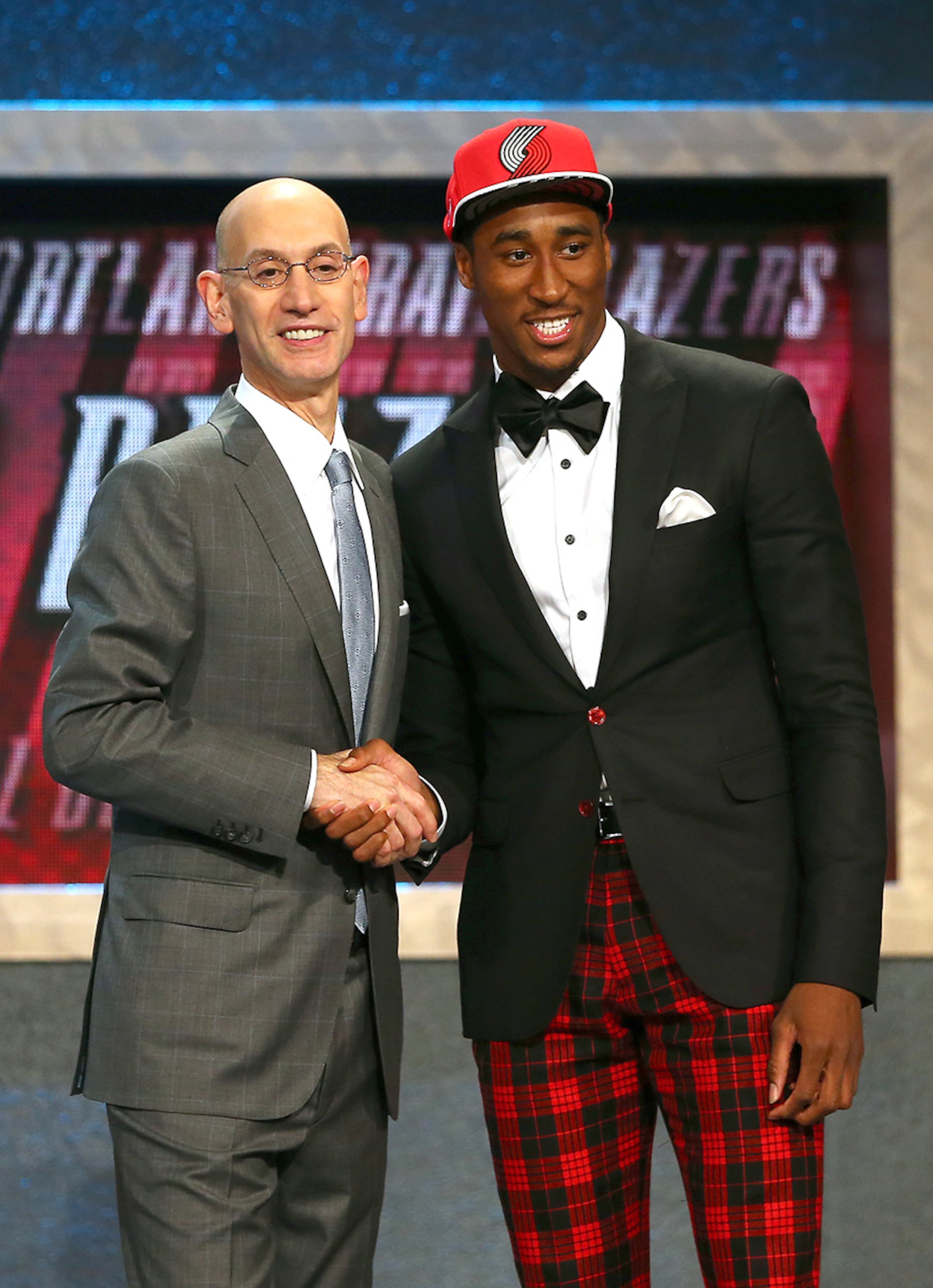 NEW YORK, NY - JUNE 25: Rondae Hollis-Jefferson meets Commissioner Adam Silver after being selected 23rd overall by the Portland Trail Blazers in the First Round of the 2015 NBA Draft at the Barclays Center on June 25, 2015 in the Brooklyn borough of New York City. NOTE TO USER: User expressly acknowledges and agrees that, by downloading and or using this photograph, User is consenting to the terms and conditions of the Getty Images License Agreement. (Photo by Elsa/Getty Images)