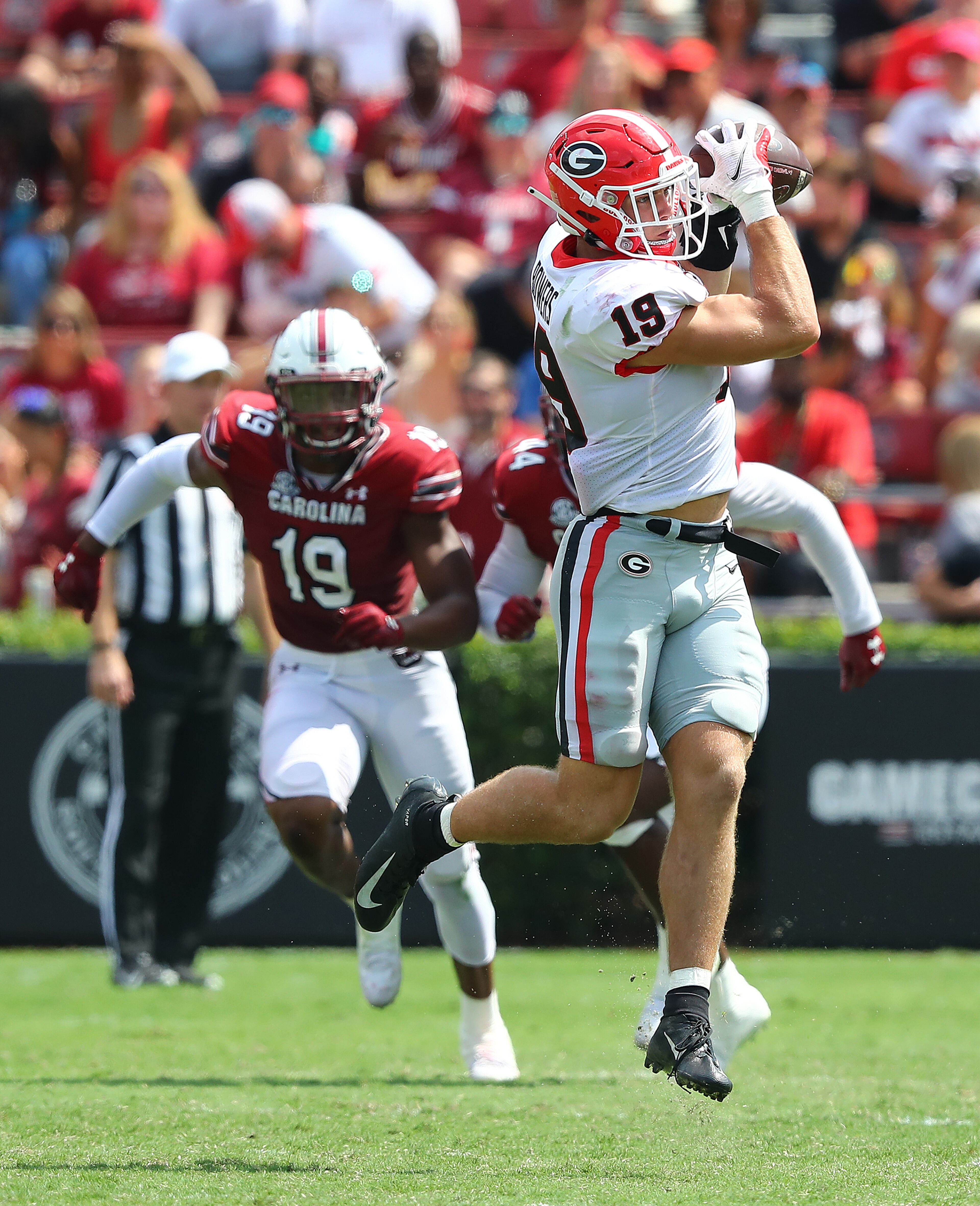 Georgia tight end Brock Bowers catches a pass and runs for a touchdown, his third score of the day, to take a 31-0 lead over South Carolina during the third quarter in a NCAA college football game on Saturday, Sept. 17, 2022, in Columbia. “Curtis Compton / Curtis Compton@ajc.com