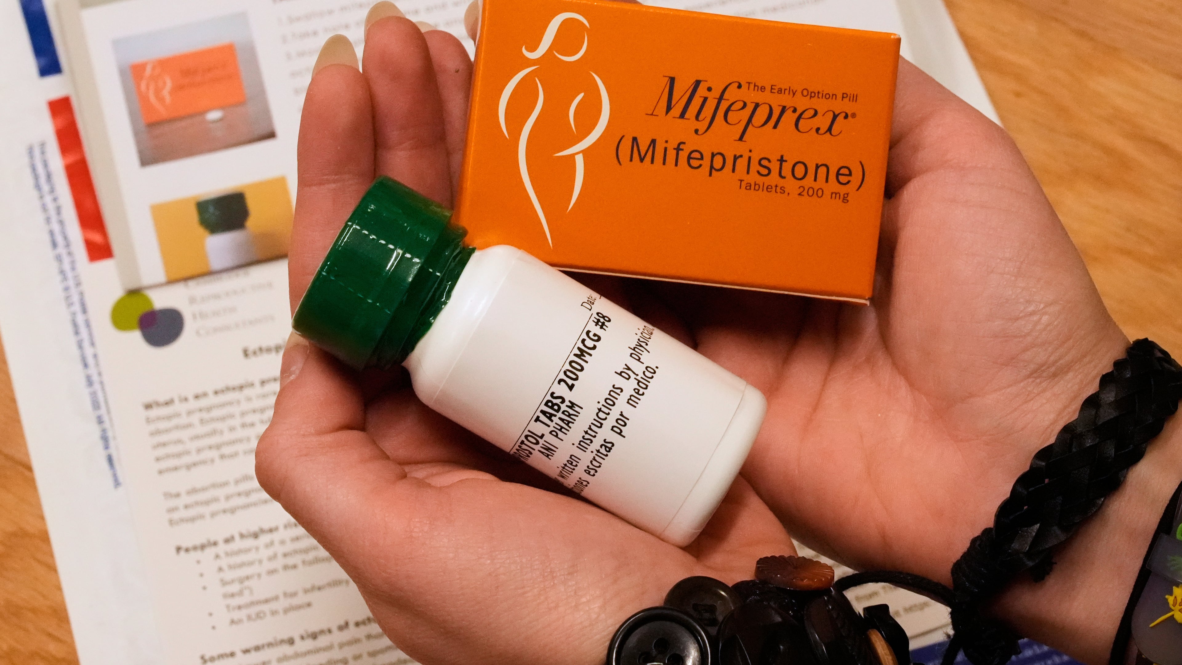 FILE - A coordinator shows the medications and care kit sent out the clients at the Massachusetts Medication Abortion Access Project, May 13, 2025, in Somerville, Mass. (AP Photo/Charles Krupa, File)