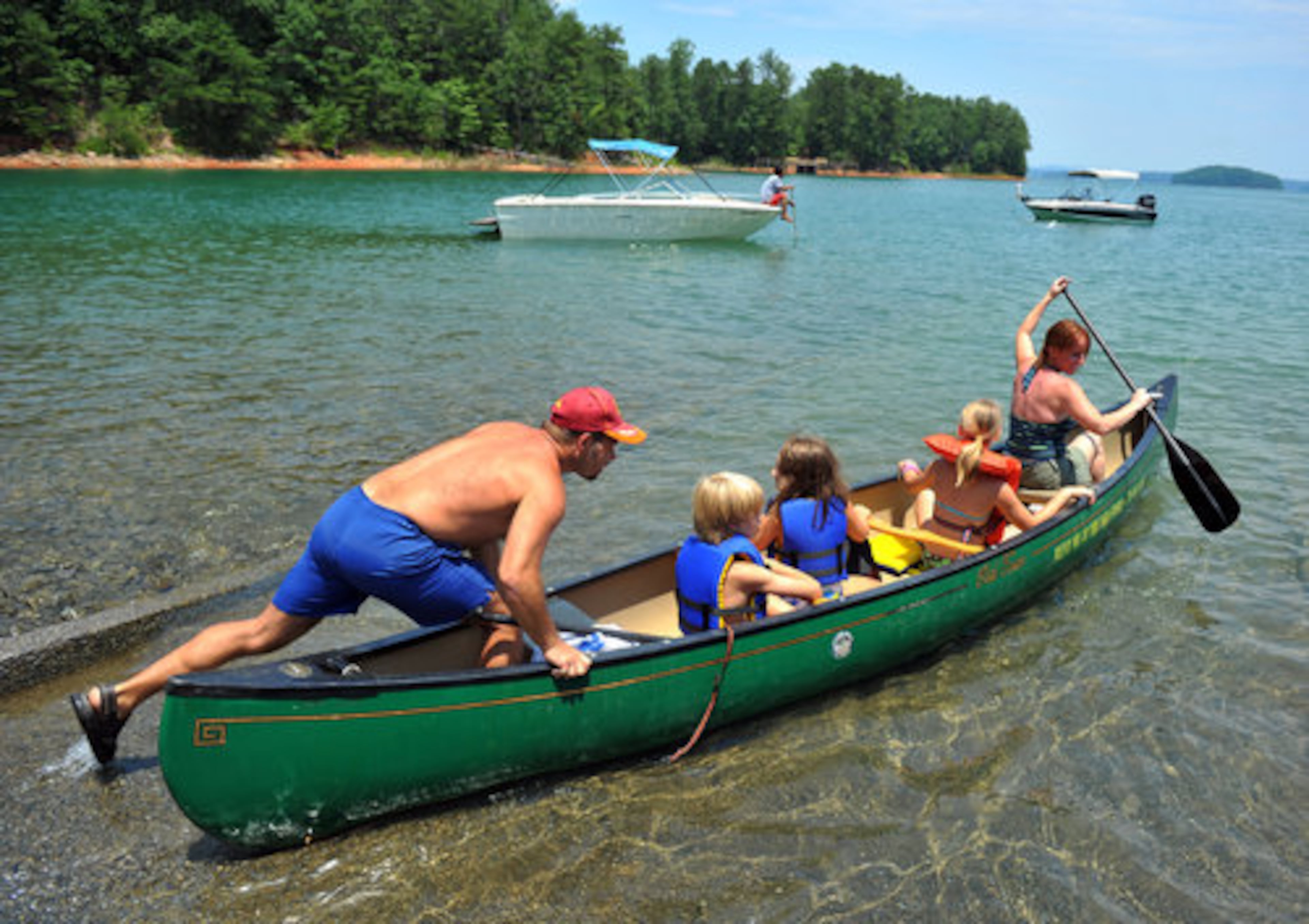 Dave and Jill Boldt from Texas launch a rented canoe at East Bank Park on Lake Lanier. The Boldts visited Lake Lanier in 2007 and were disappointed when they could not have a camp fire due to drought conditions.