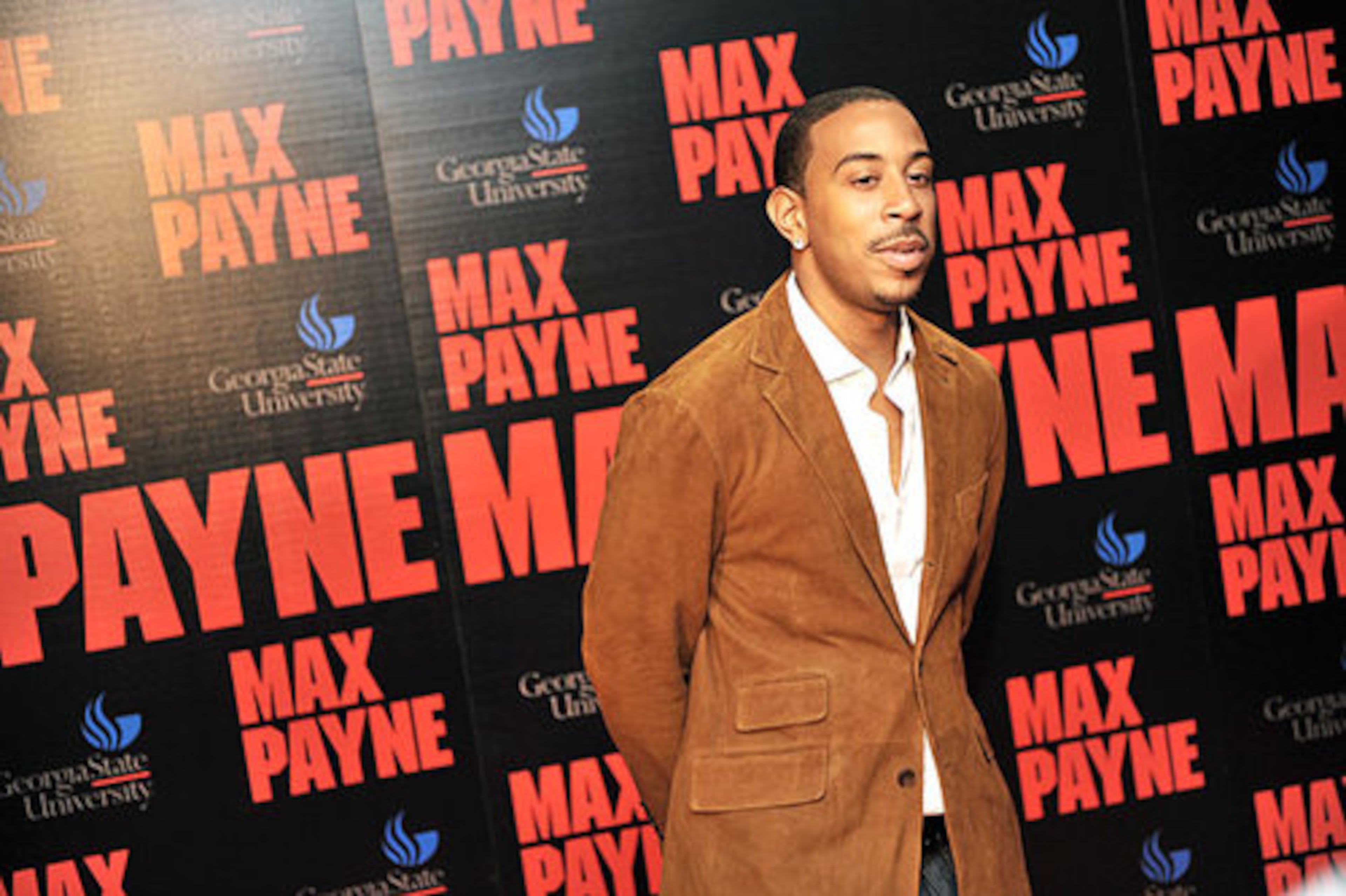 Ludacris is co-star in "Max Payne" with Mark Wahlberg. The movie is scheduled to open Oct. 17. Ludacris poses in front of a large wall poster that makes no mistake about what the name of the movie is.
