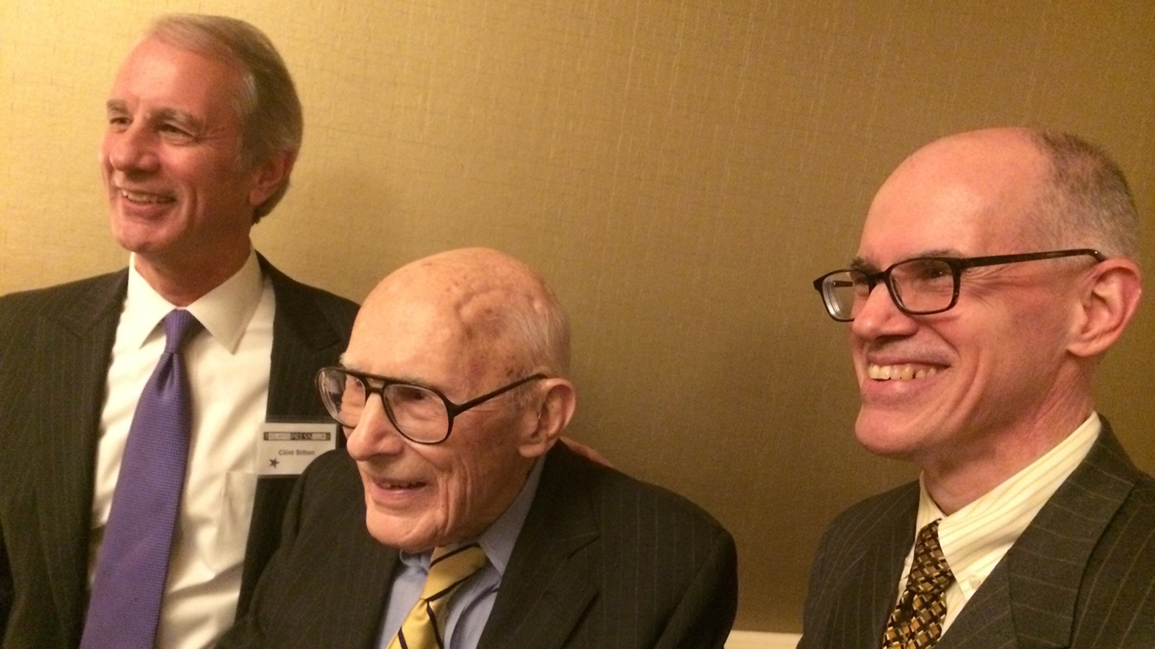 Claude Sitton, center, with sons Clint, left and Mac in November when Sitton was inducted into the Atlanta Press Club's Hall of Fame. BO EMERSON/bo.emerson@ajc.com