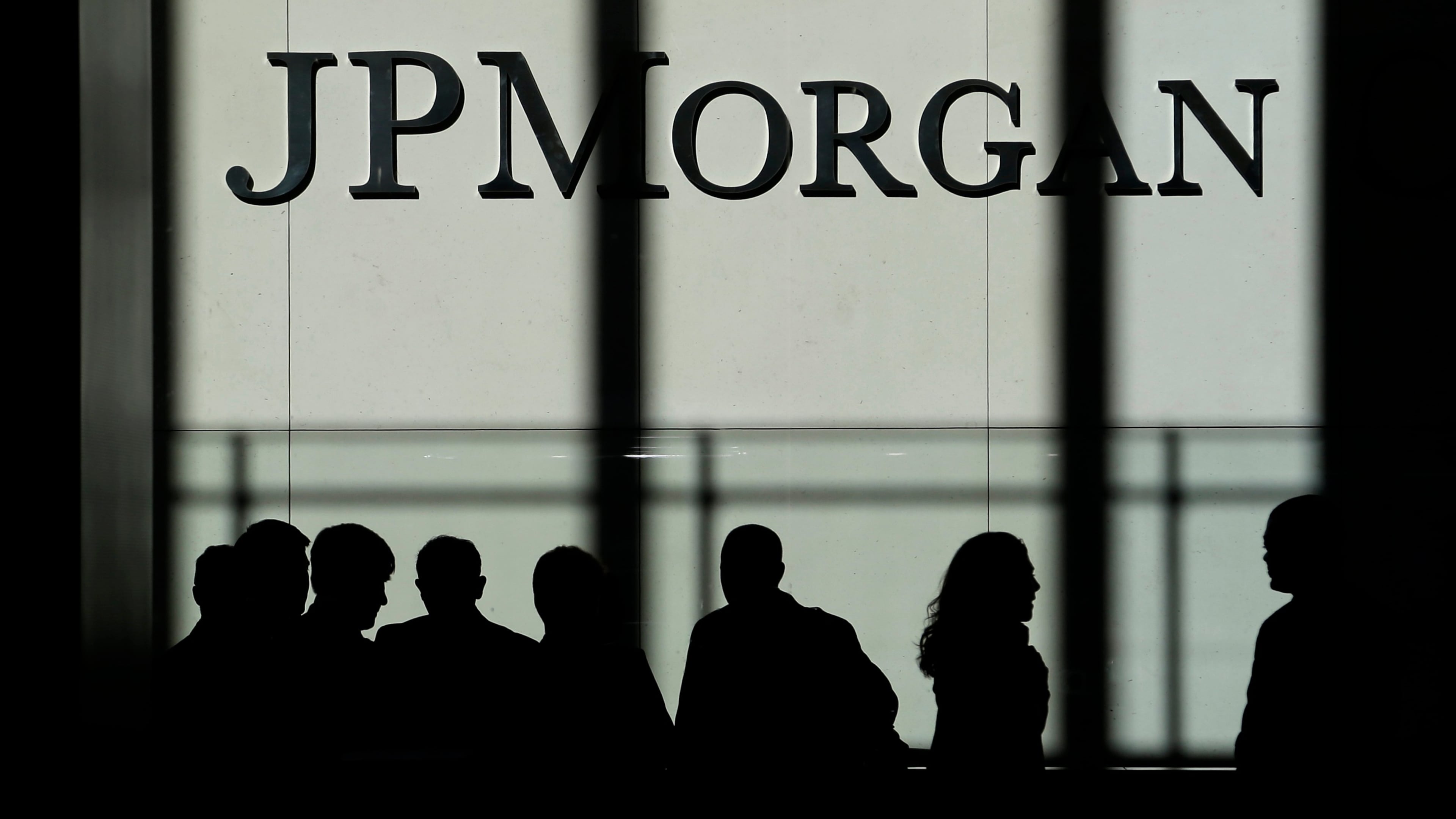 FILE - In this Monday, Oct. 21, 2013, file photo, the JPMorgan Chase & Co. logo is displayed at their headquarters in New York. (AP Photo/Seth Wenig, File)