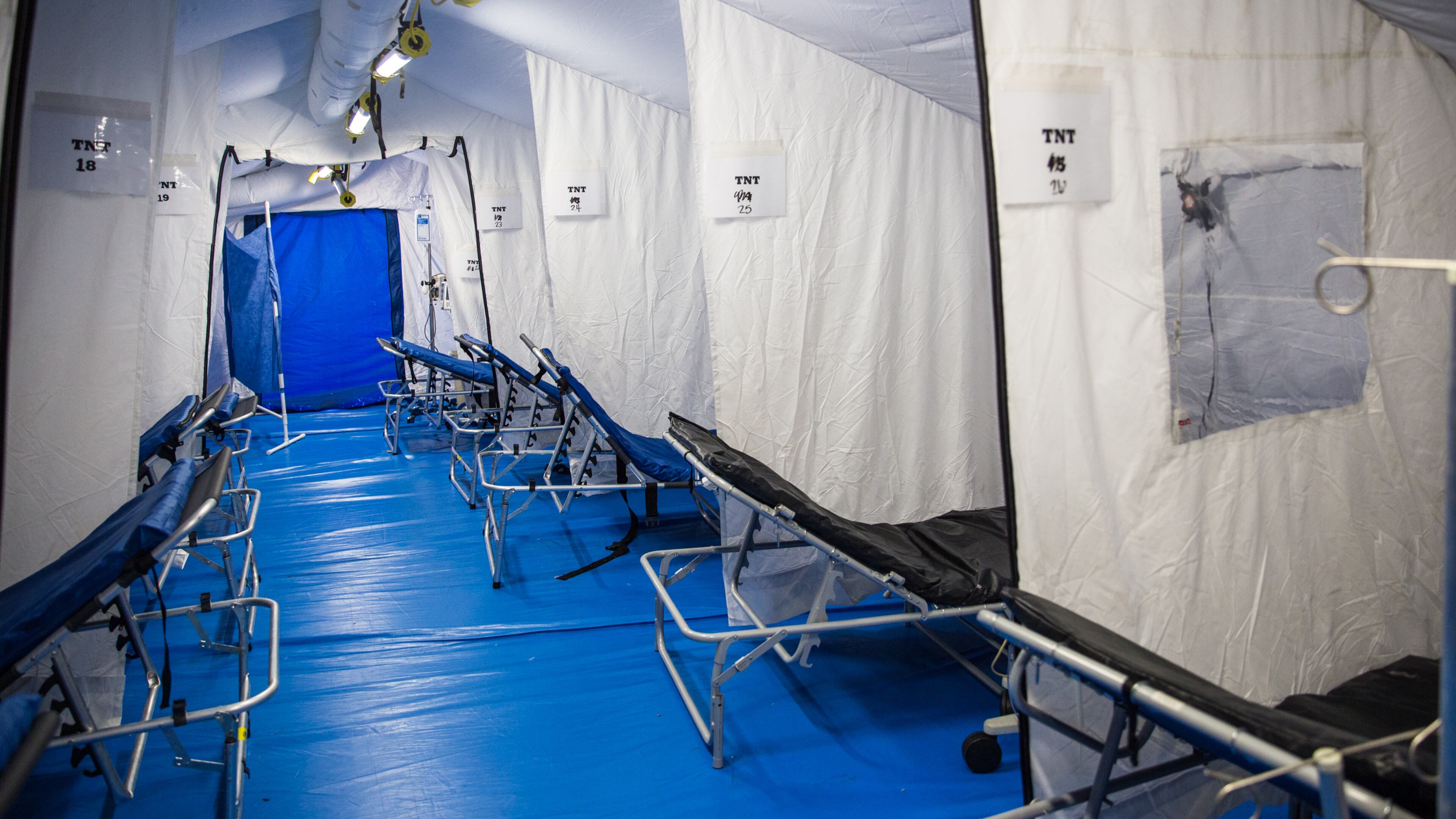 Northeast Georgia Medical Center in Gainesville was dealing with their third surge of Covid cases Thursday, Dec 3, 2020. The hospital system has built multiple spaces, including this tent set up outside the ambulance entrance to serve Covid patients and create less exposure to other patients. This tent is where four Covid patients were given therapeutics yesterday, allowing for treatment without entering the main facility. The day after Thanksgiving was a record for the hospital intaking Covid patients. (Jenni Girtman for The Atlanta Journal Constitution)
