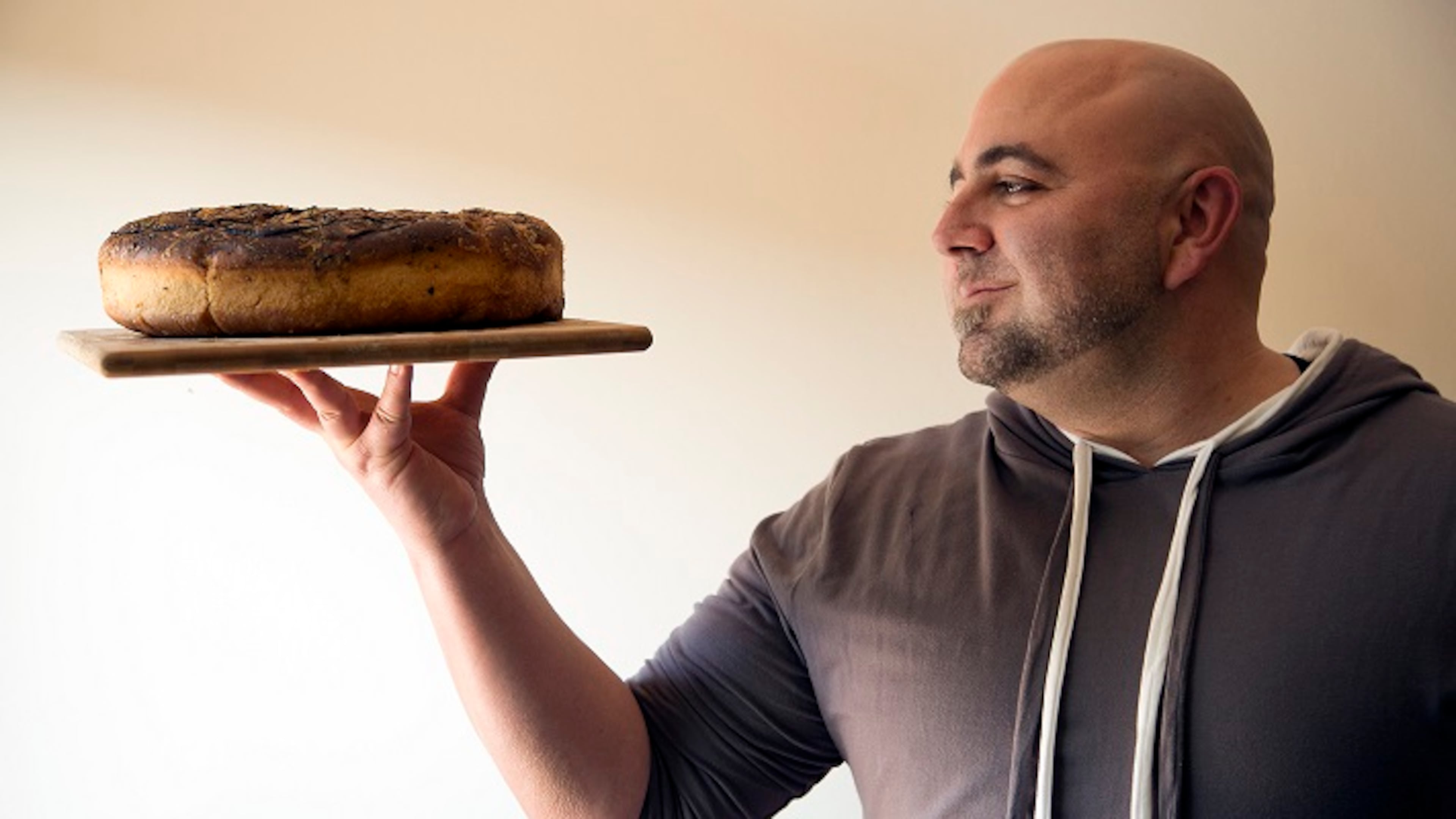 Duff Goldman holds his focaccia. (Myung J. Chun/Los Angeles Times/TNS)