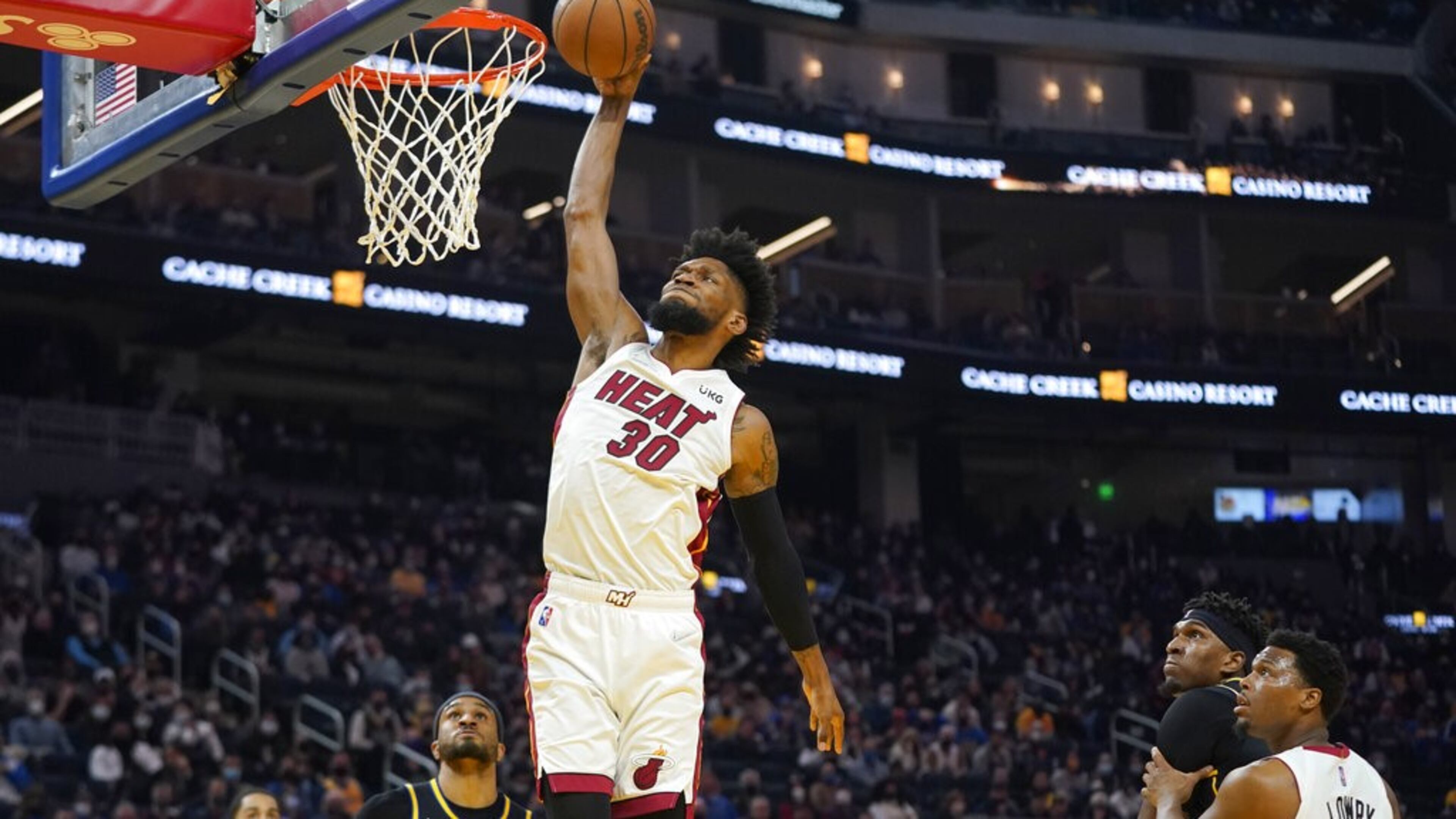Chris Silva scores while playing for the Miami Heat during the 2021-22 season.
