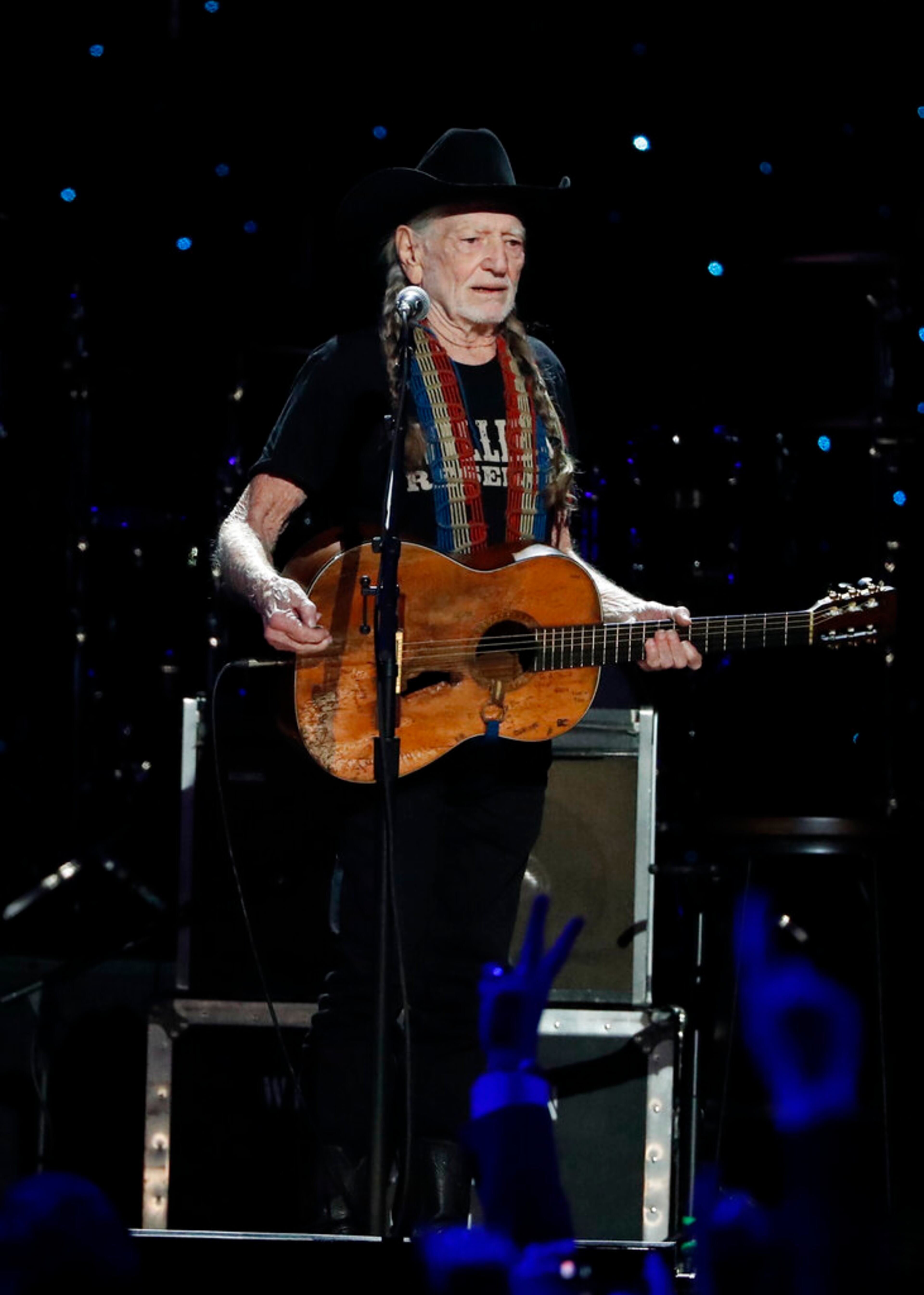 Willie Nelson performs at Willie: Life & Songs Of An American Outlaw at Bridgestone Arena on Saturday, Jan. 12, 2019, in Nashville, Tenn. (Photo by Al Wagner/Invision/AP)