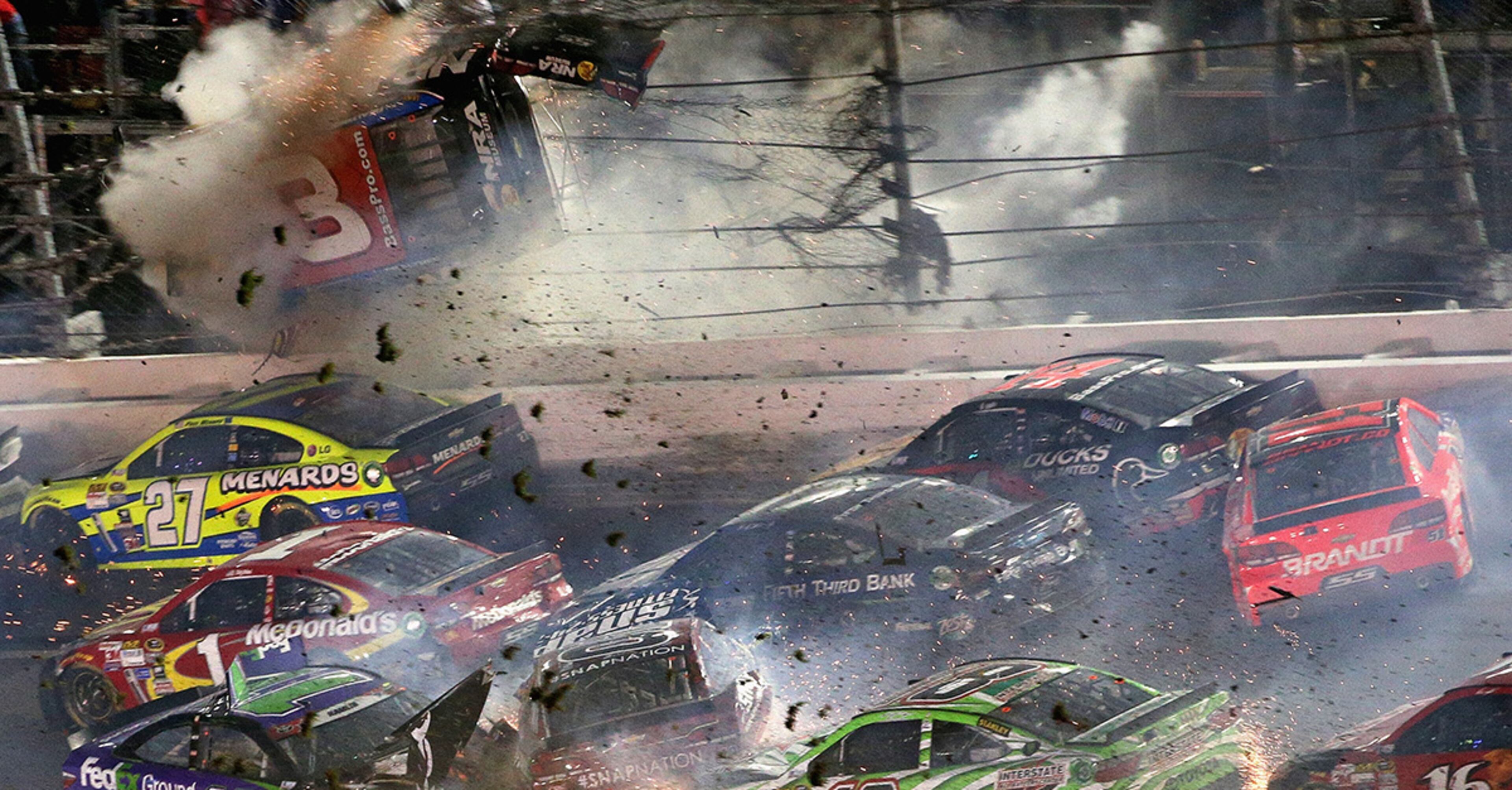 DAYTONA BEACH, FL - JULY 06: Austin Dillon, driver of the #3 Bass Pro Shops Chevrolet, is involved in an on-track incident following the checkered flag during the NASCAR Sprint Cup Series Coke Zero 400 Powered by Coca-Cola at Daytona International Speedway on July 6, 2015 in Daytona Beach, Florida. (Photo by Patrick Smith/Getty Images)