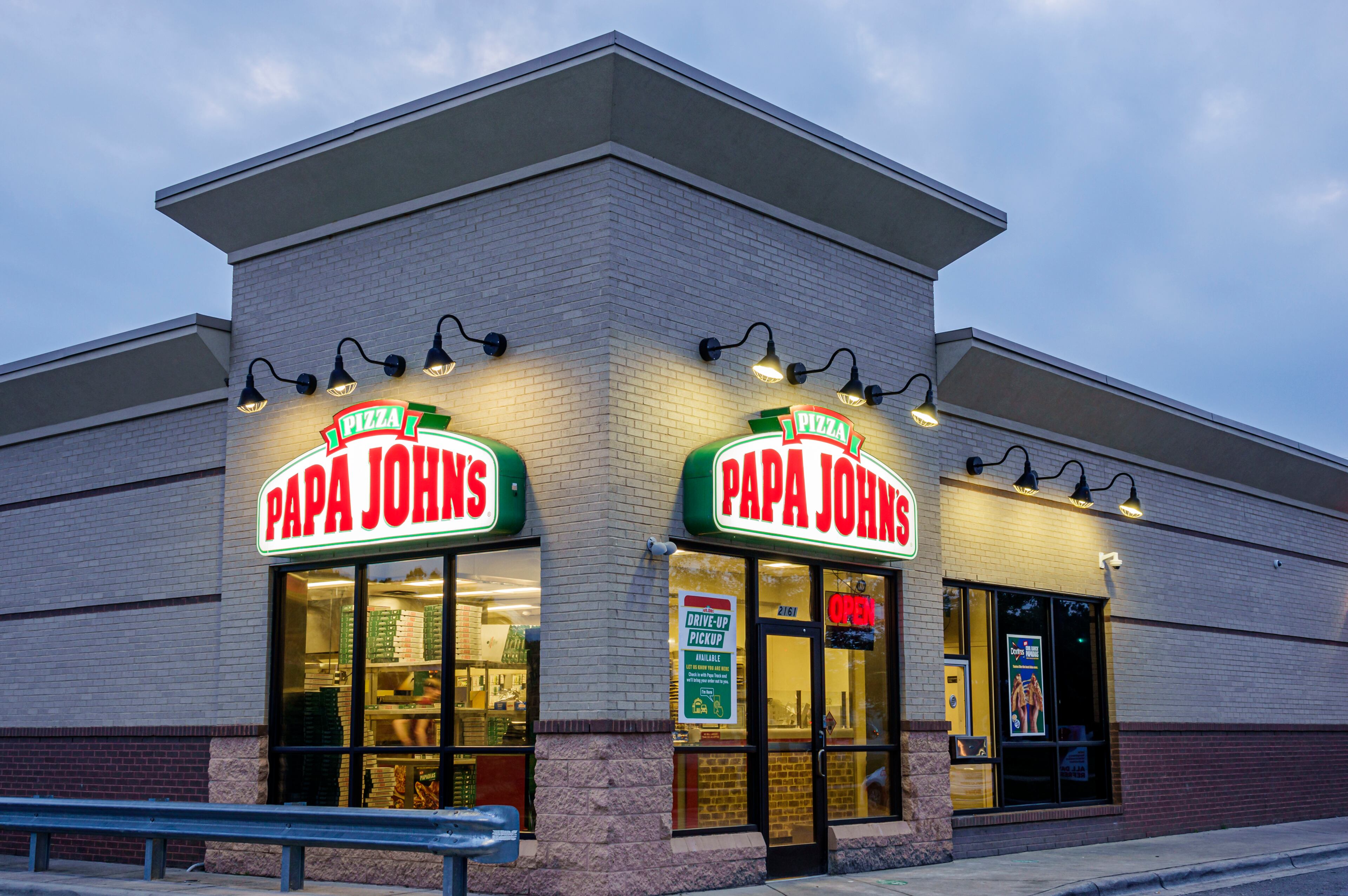 Gastonia, North Carolina, Papa John's pizza restaurant at dusk