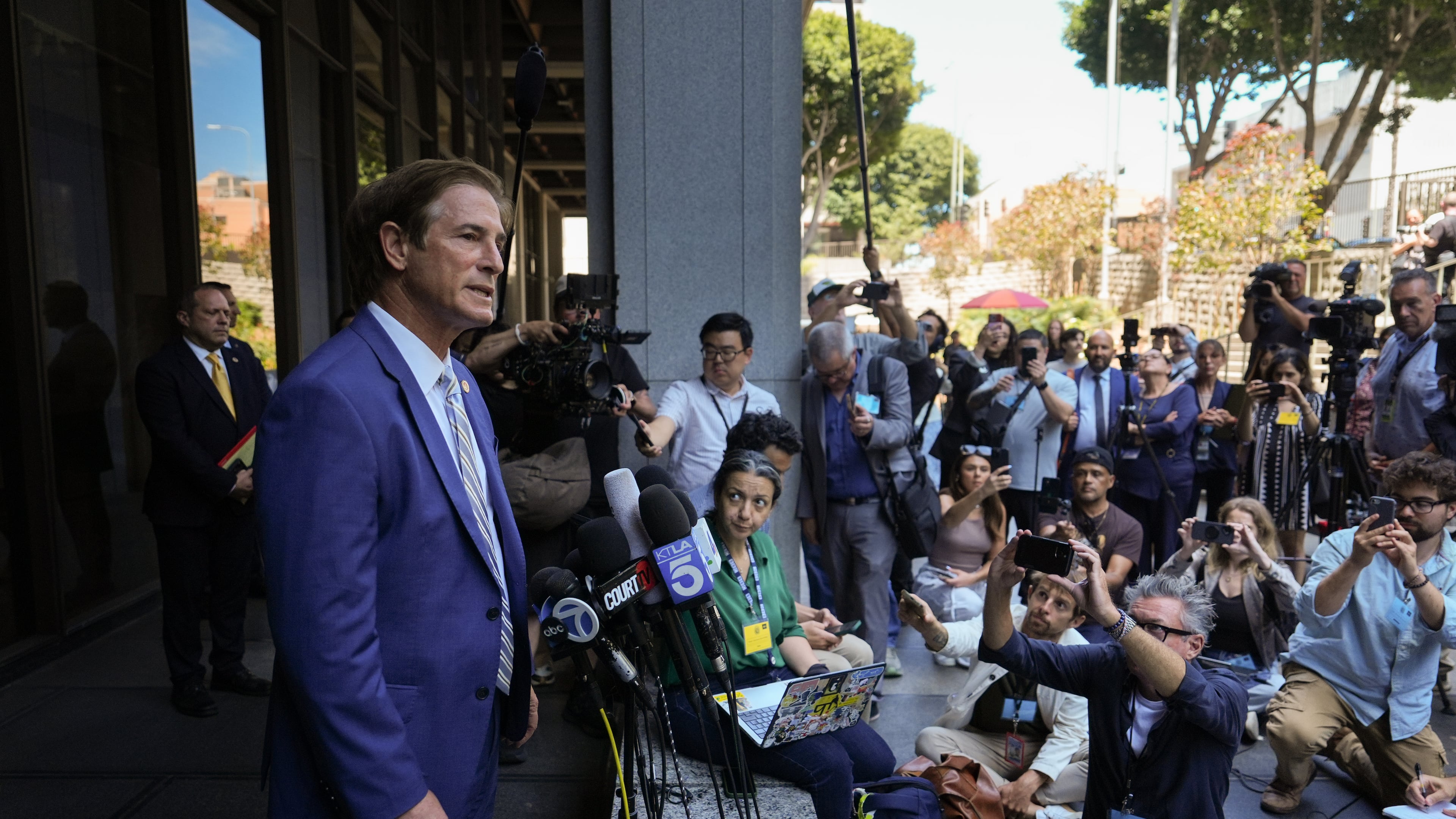 Los Angeles County District Attorney Nathan Hochman speaks to reporters in Los Angeles Tuesday, July 21, 2026, regarding the case of David Anthony Burke, known as D4vd, who was charged with killing a 14-year-old girl whose dismembered body was found in his car. (AP Photo/Jae C. Hong)