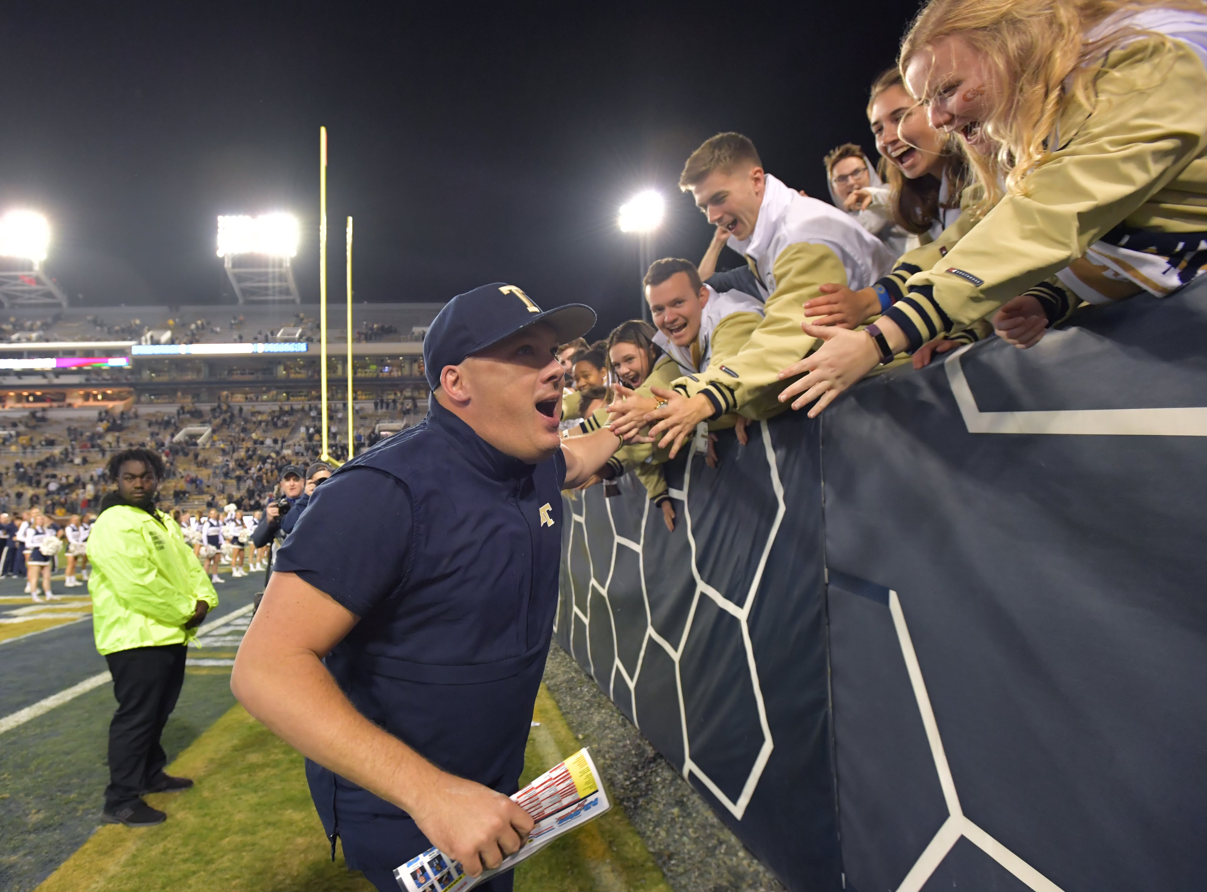 Georgia Tech head coach Geoff Collins celebrates the victory over North Carolina State at Bobby Dodd Stadium on Thursday, November 21, 2019. Georgia Tech won 28-26. (Hyosub Shin / Hyosub.Shin@ajc.com)