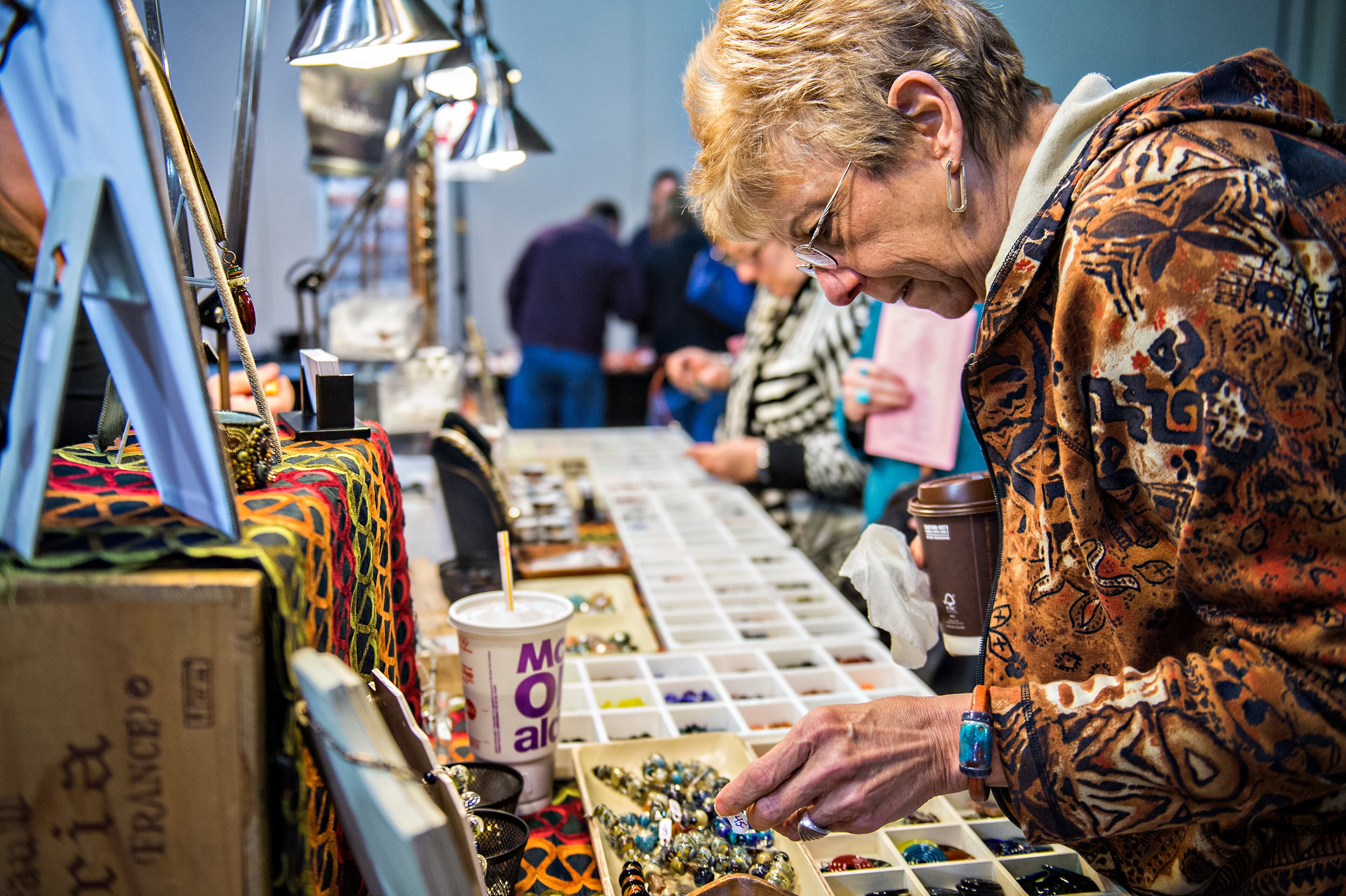 Sandy Azzarello (right) checks out the different beads for sale during the Intergalactic Bead Show at the Infinite Energy Center in Duluth on Saturday, Feb. 6, 2016. JONATHAN PHILLIPS / SPECIAL