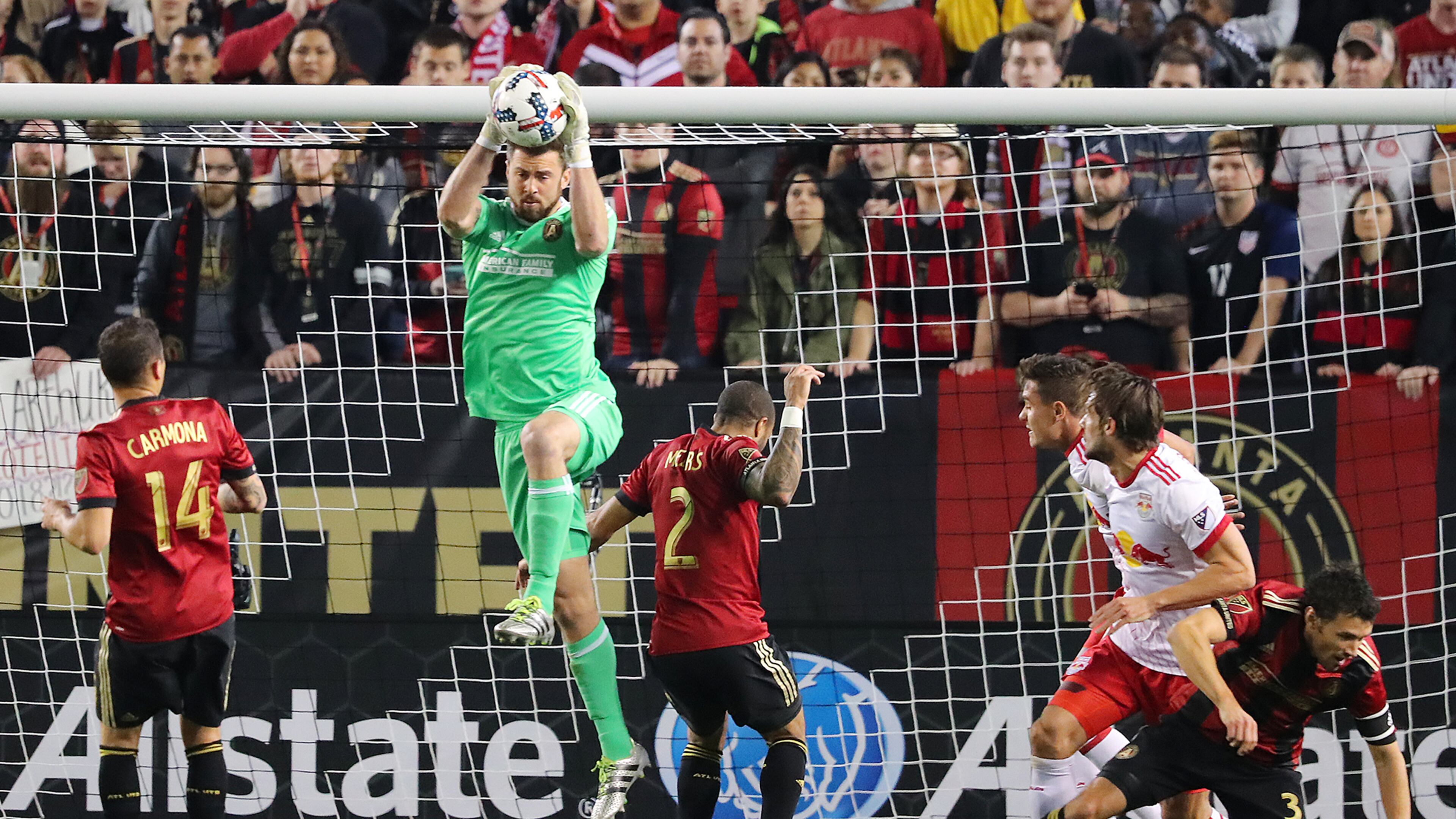 Atlanta United RC goalkeeper Alec Kann saves a shot against the N.Y. Red Bulls during their first game in franchise history on Sunday, March 5, 2017, in Atlanta. (Curtis Compton/ccompton@ajc.com)