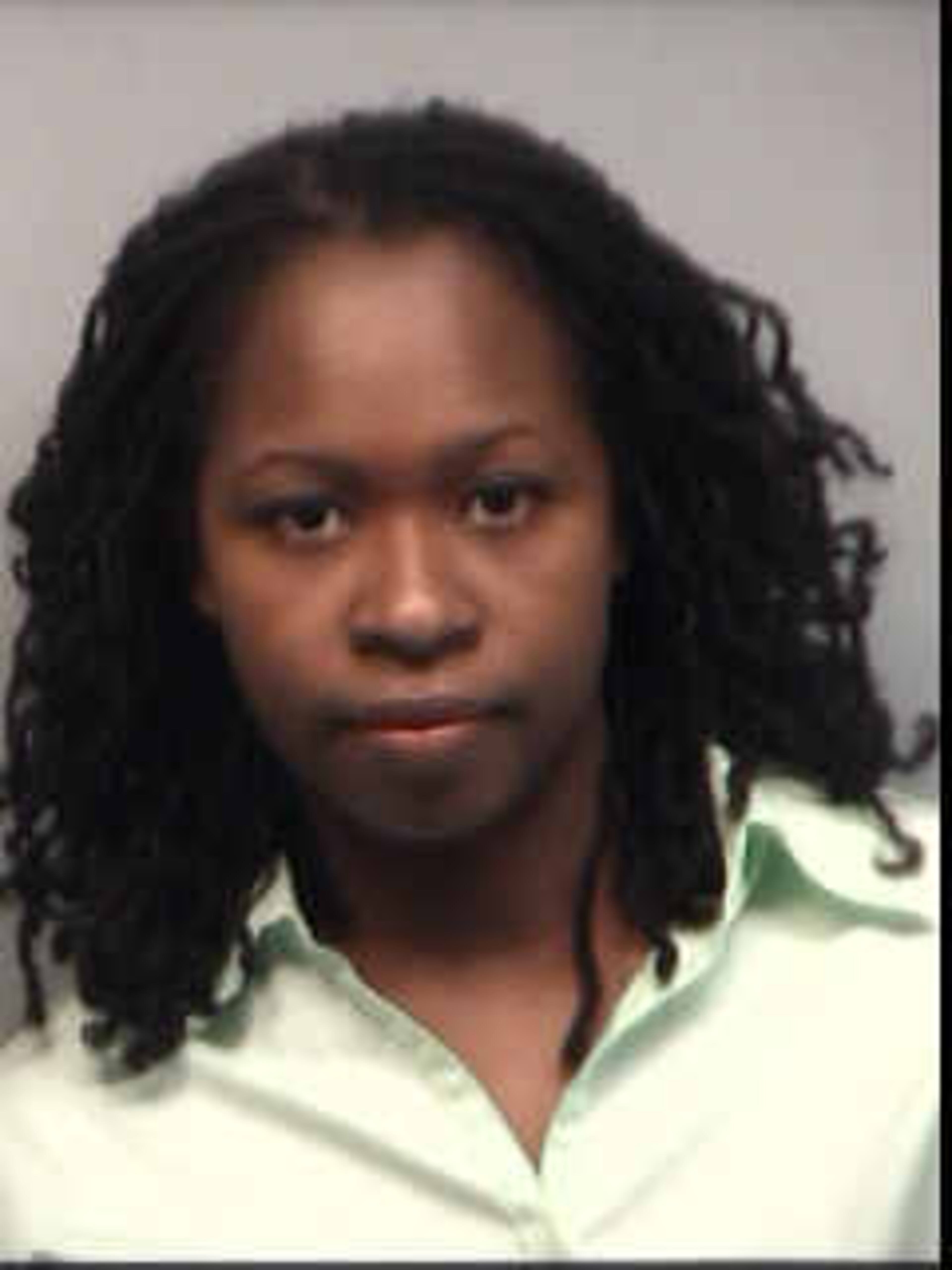 Shani Robinson, 29, teacher, Dunbar Elementary, was booked into the Fulton County Jail on $40,000 bond, according to jail records. Robinson is charged with racketeering, false statements and writings.