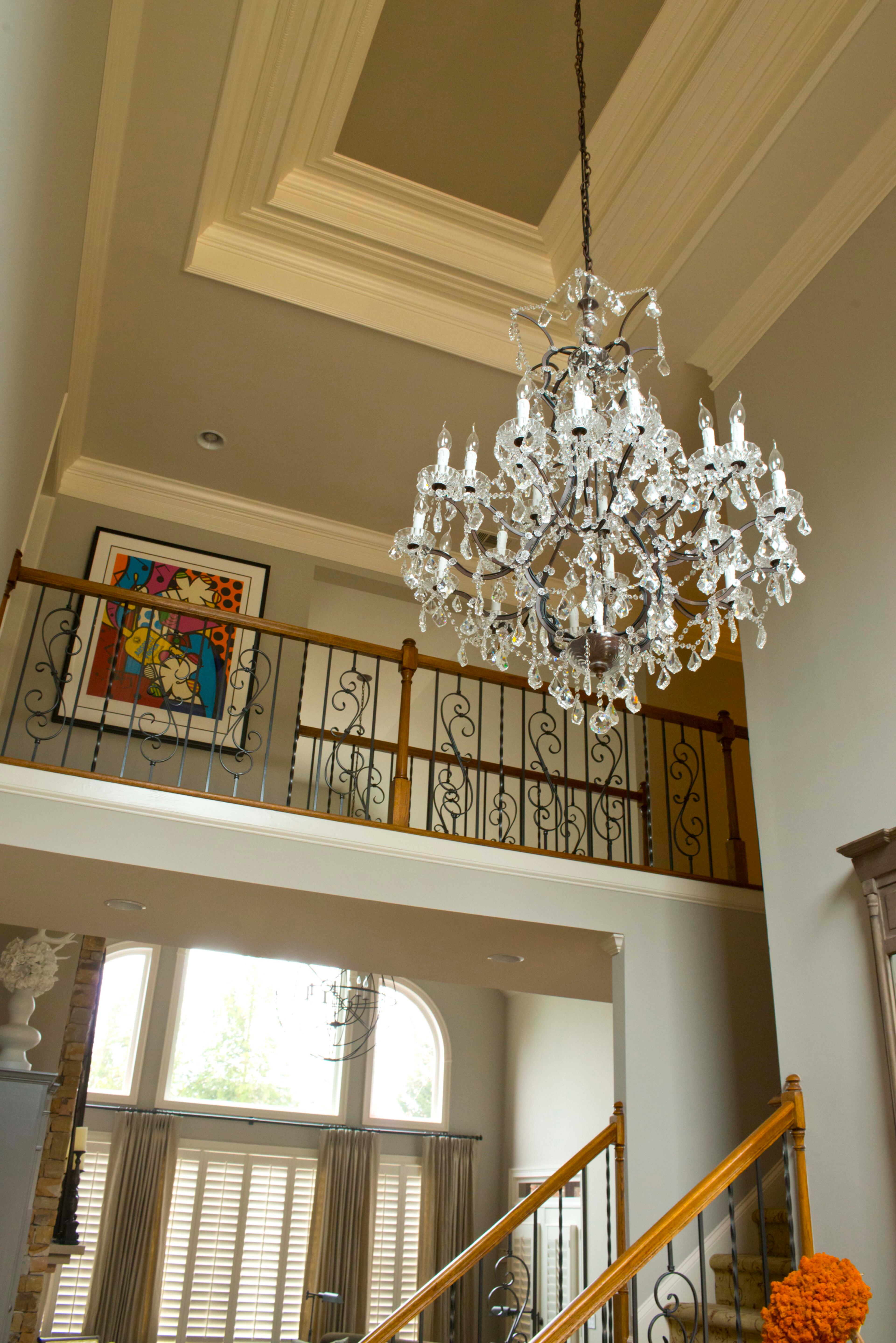The home’s interior has gravitated to a transitional style with neutral walls and strong accent pieces, including contemporary botanical sculptures, mirrors and artwork. -- Text by Lori Johnston, for the AJC